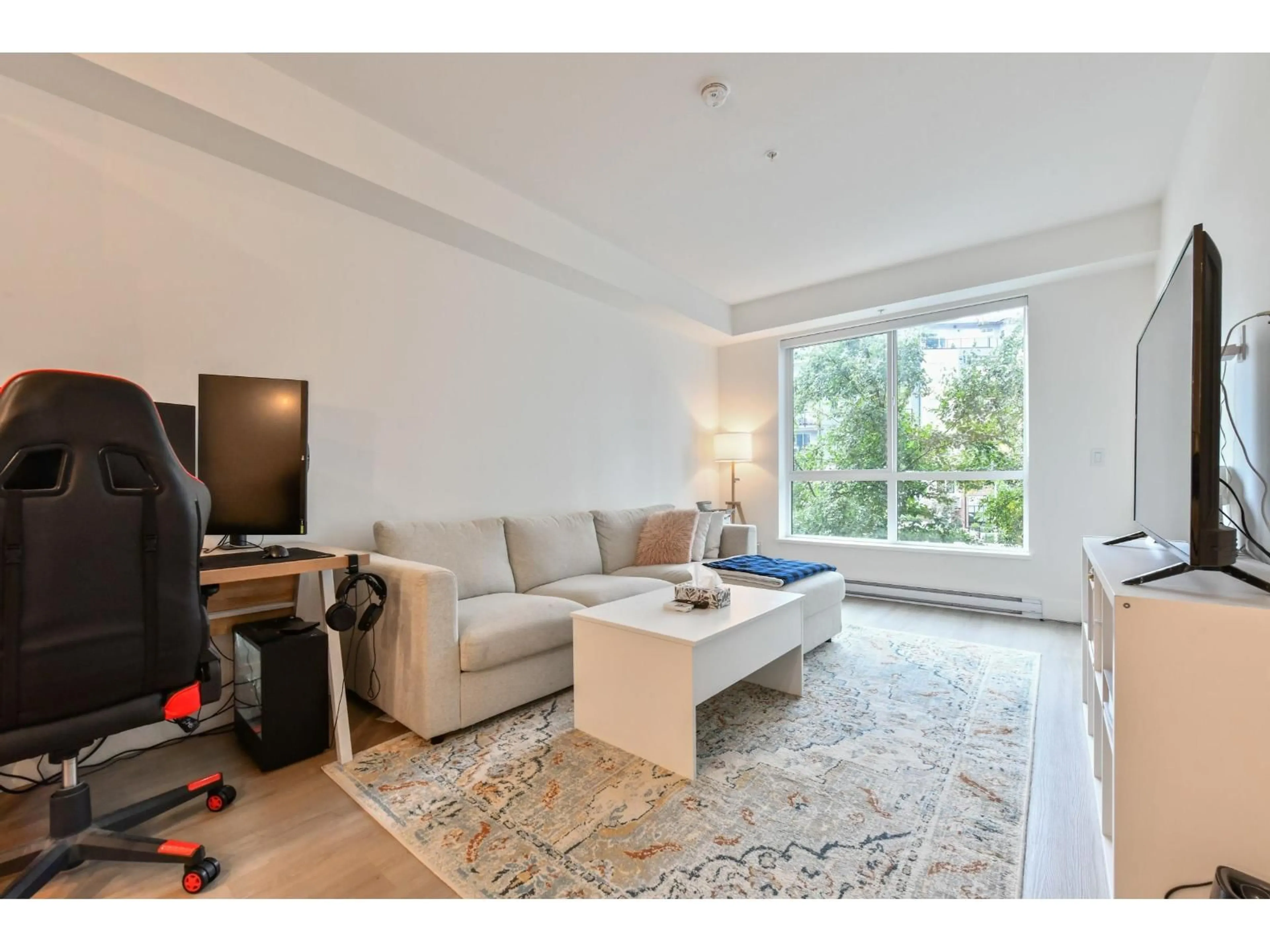 Living room with furniture, unknown for 217 - 3438 146A STREET, Surrey British Columbia V4P0J1