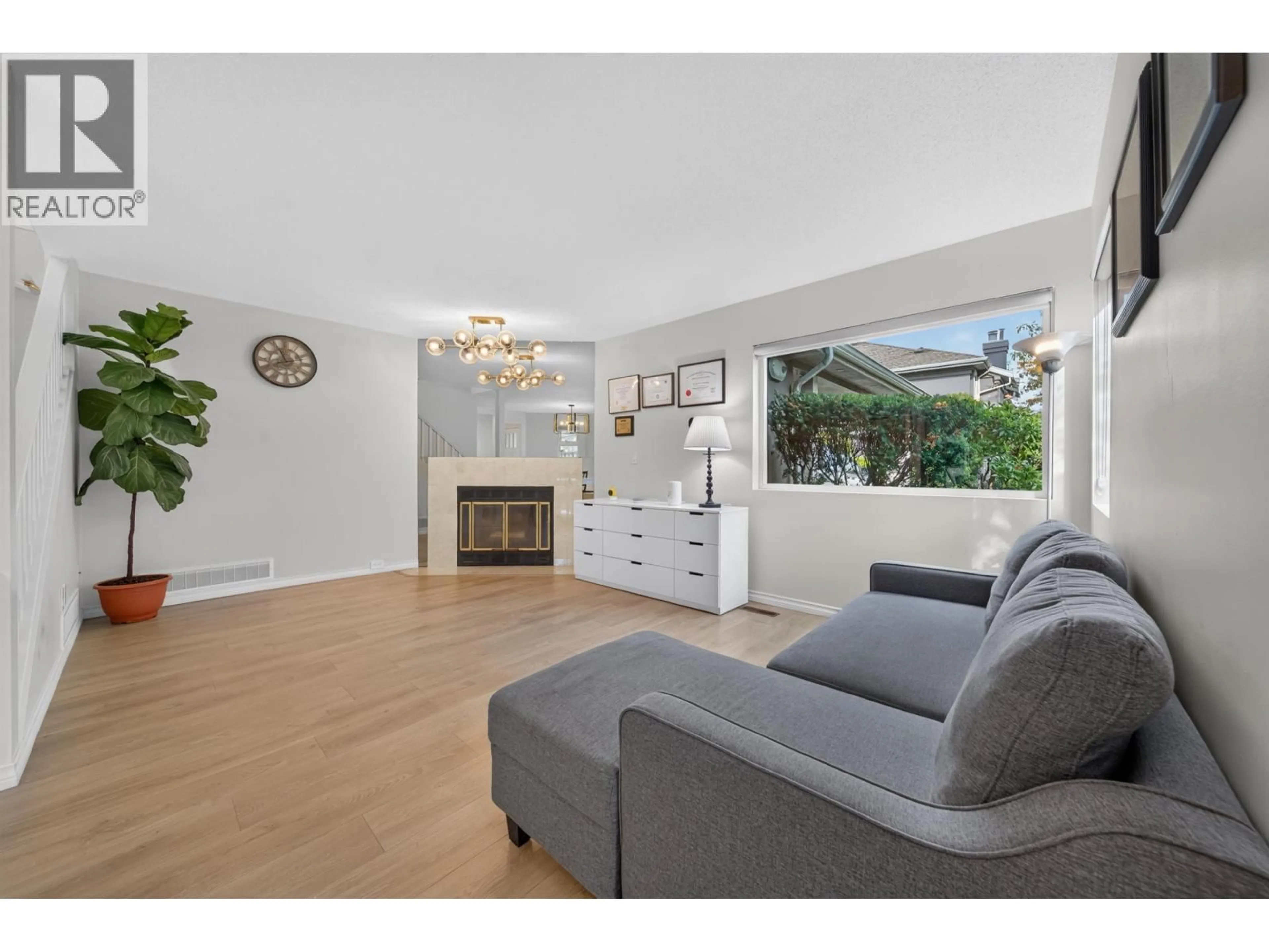 Living room with furniture, wood/laminate floor for 6 - 5111 MAPLE ROAD, Richmond British Columbia V7E5Z6