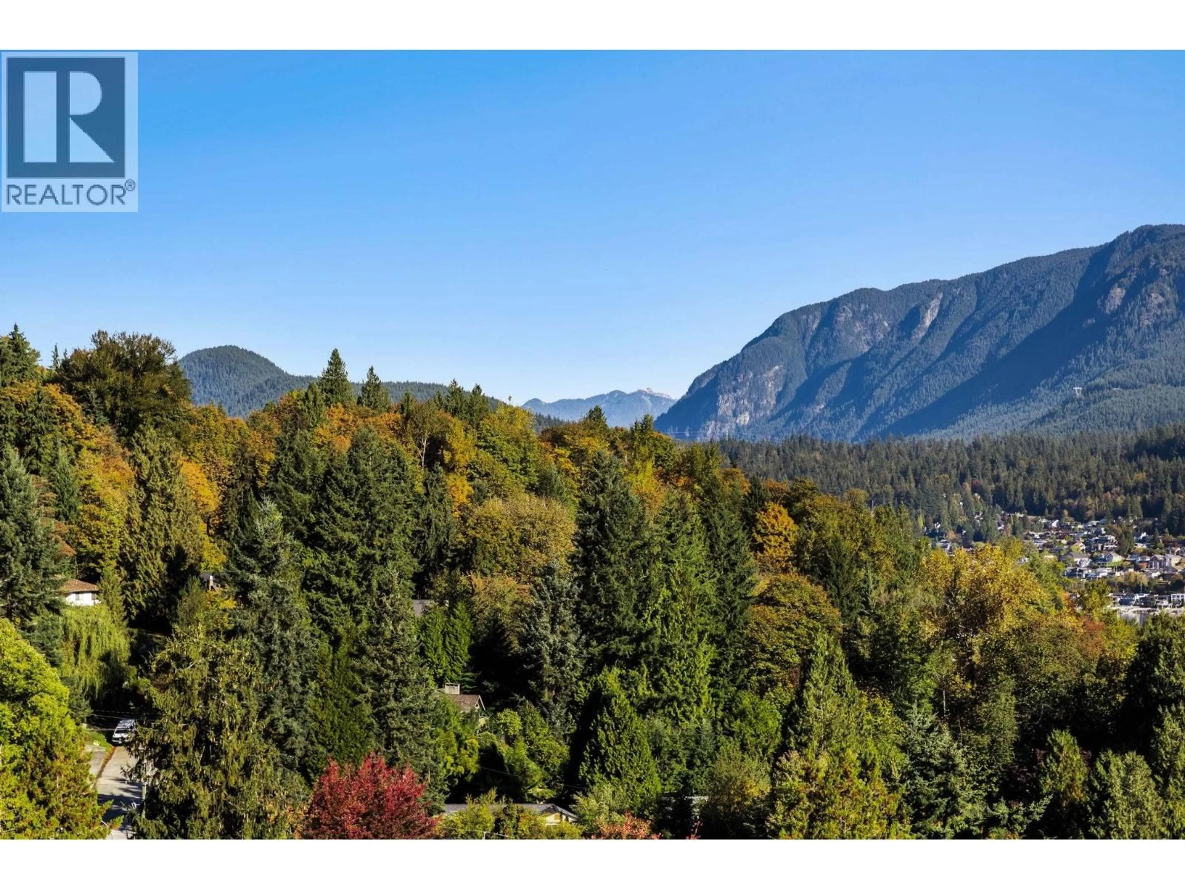 A pic from outside/outdoor area/front of a property/back of a property/a pic from drone, forest/trees view for PH604 - 2002 ST. GEORGE STREET, Port Moody British Columbia V3H0N4