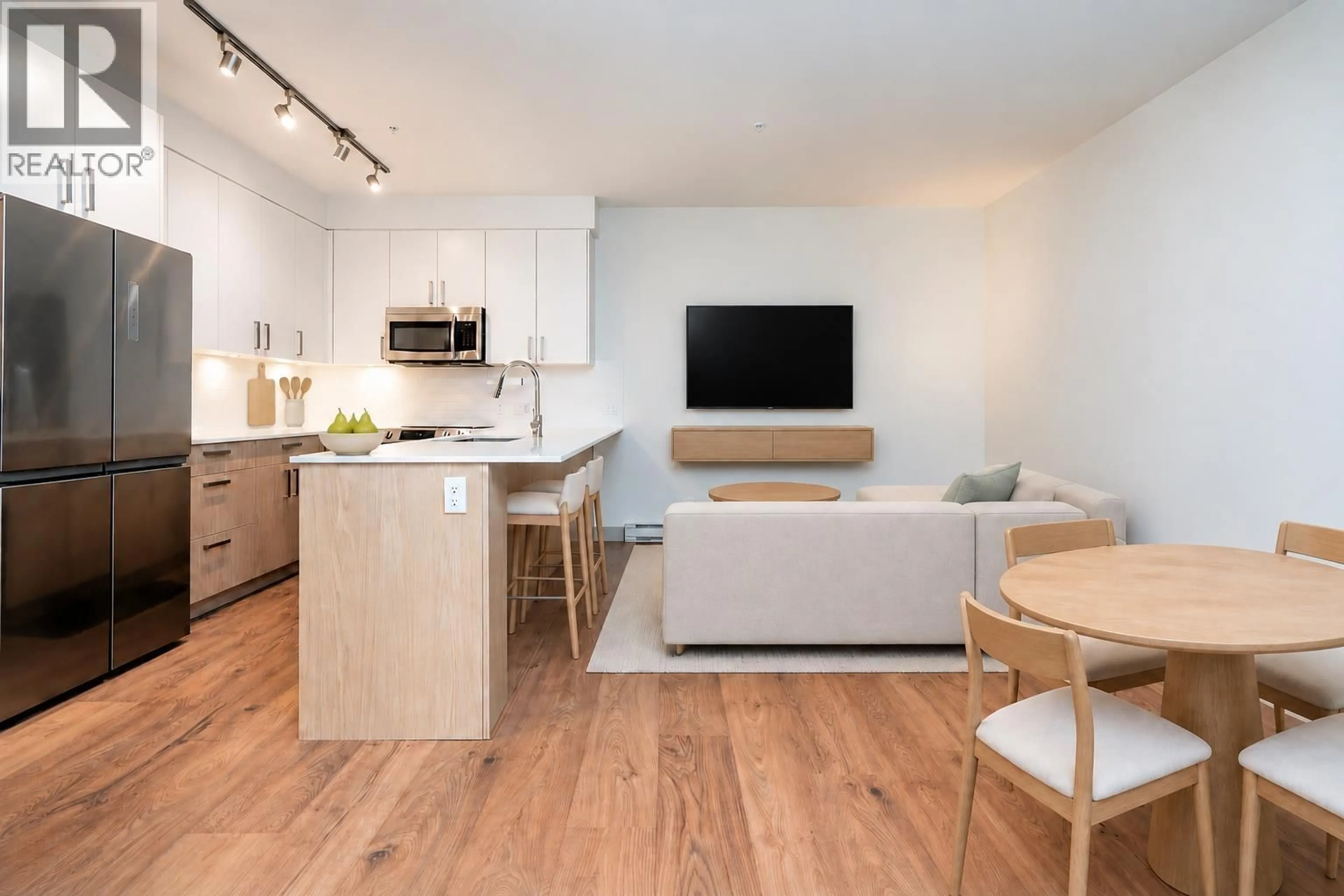 Open concept kitchen, wood/laminate floor for 209 - 6968 ROYAL OAK AVENUE, Burnaby British Columbia V5J4J2
