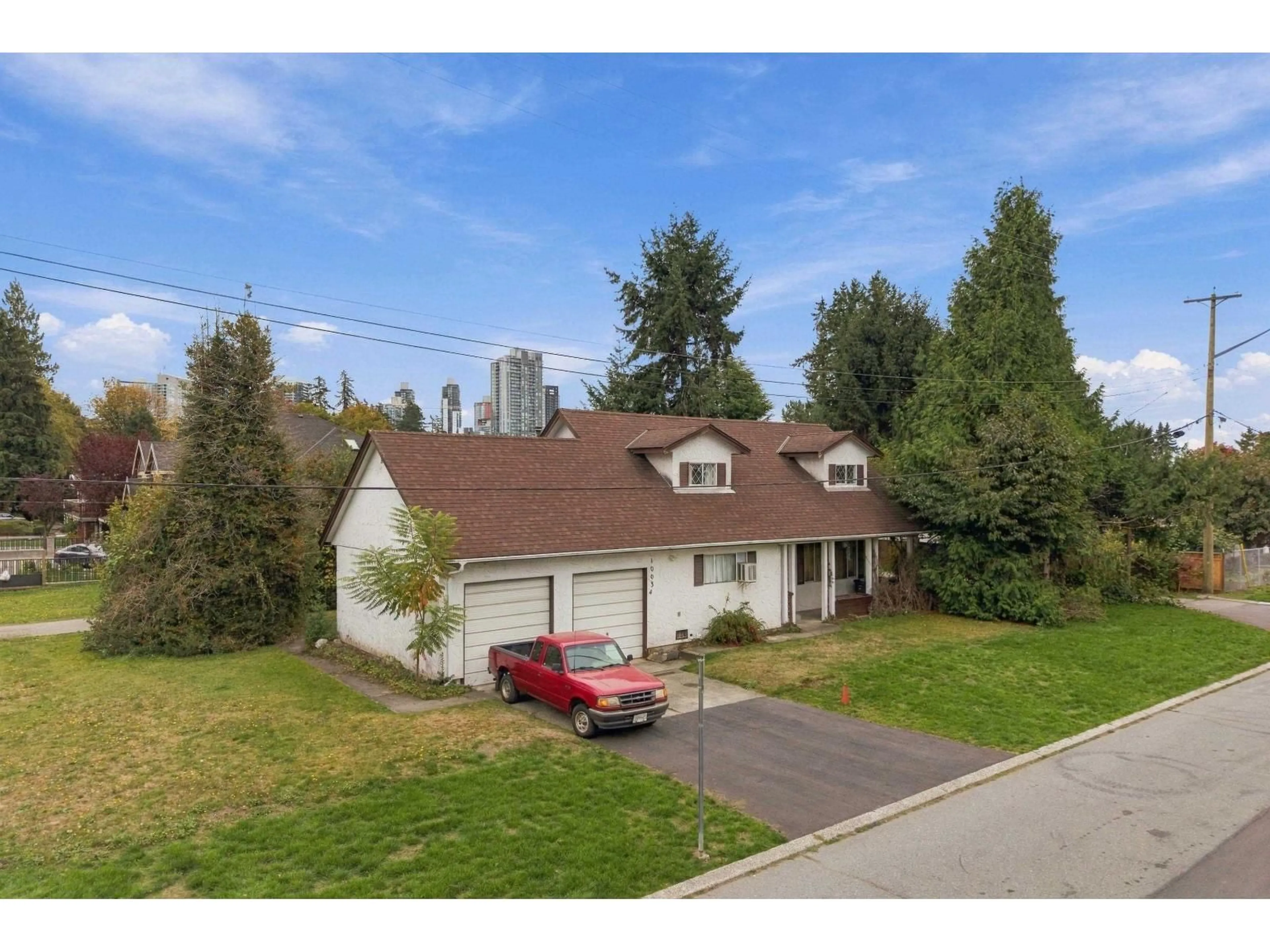 A pic from outside/outdoor area/front of a property/back of a property/a pic from drone, street for 10034 132A STREET, Surrey British Columbia V3T5B3