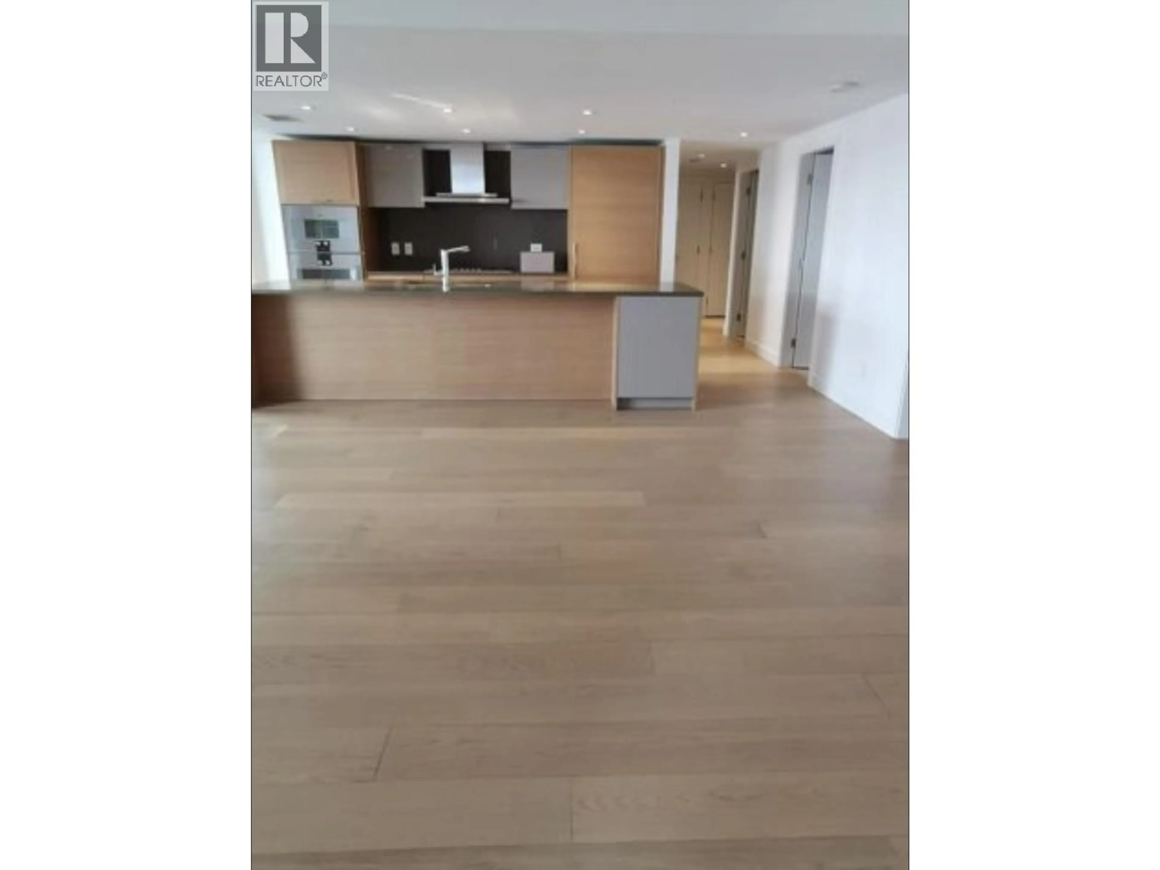 Open concept kitchen, wood/laminate floor for 504 - 1571 57TH AVENUE, Vancouver British Columbia V6P0H7