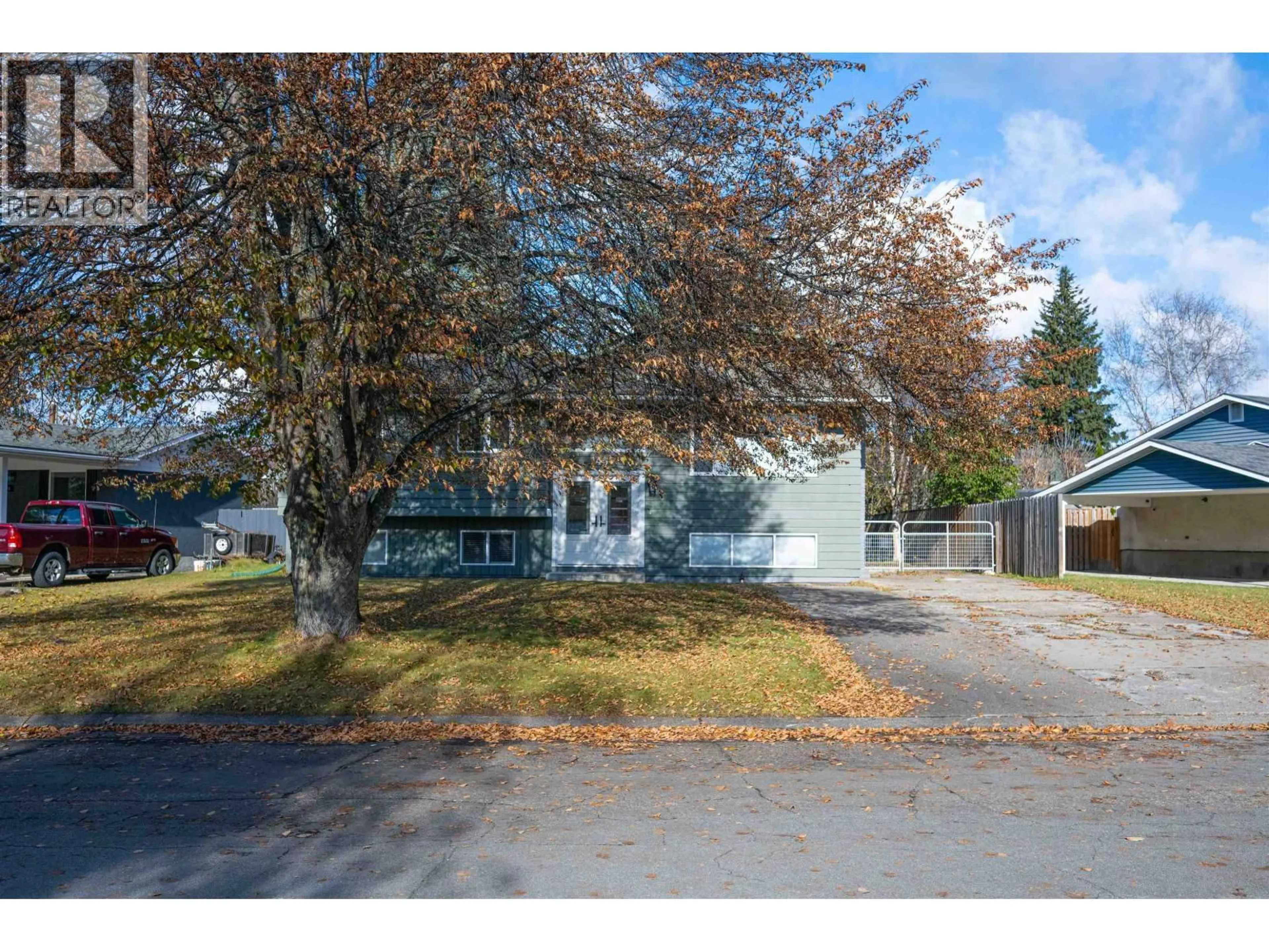 A pic from outside/outdoor area/front of a property/back of a property/a pic from drone, street for 140 MCKINLEY CRESCENT, Prince George British Columbia V2M4S2