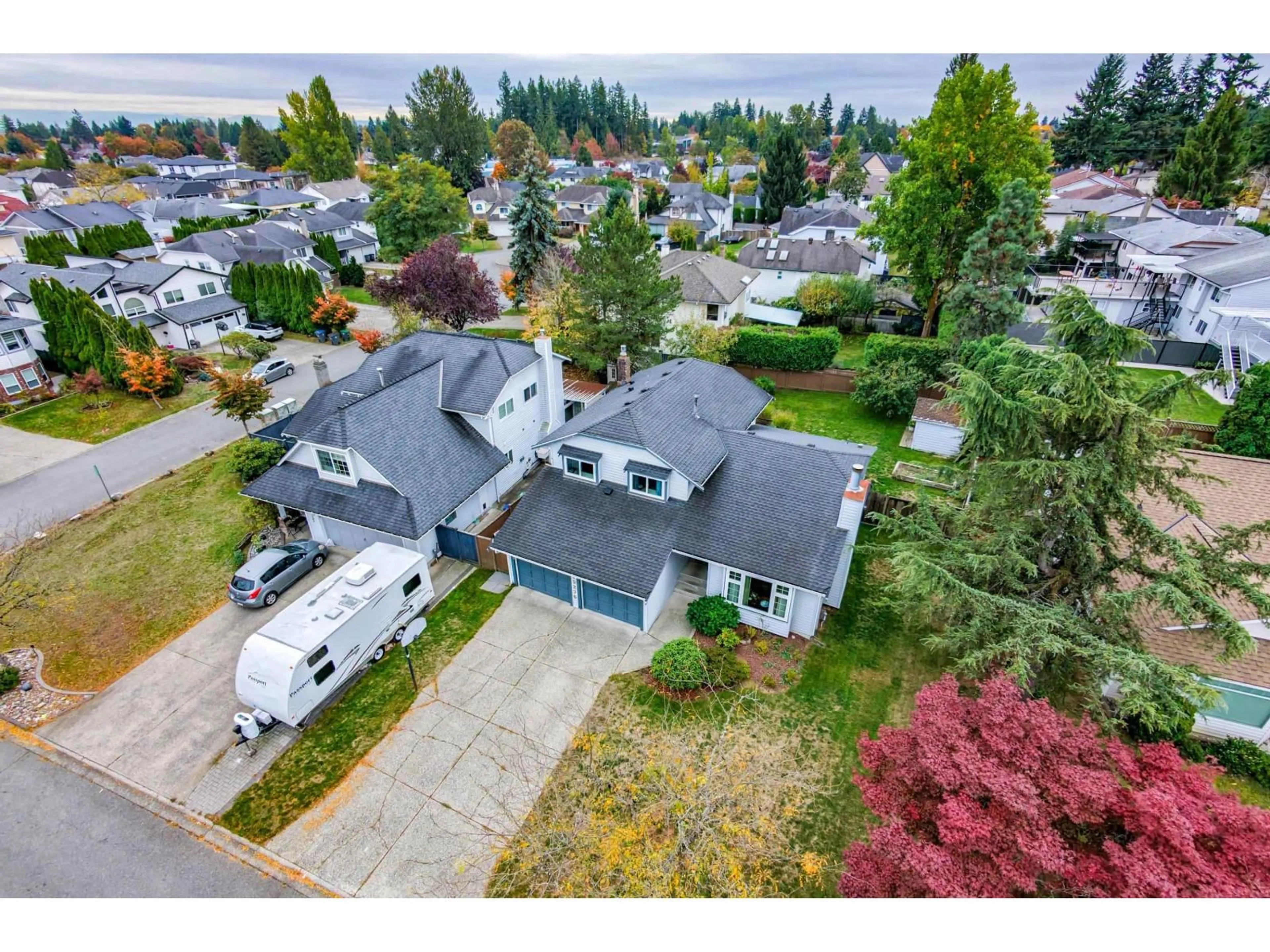 A pic from outside/outdoor area/front of a property/back of a property/a pic from drone, street for 15276 95 AVENUE, Surrey British Columbia V3R9C6