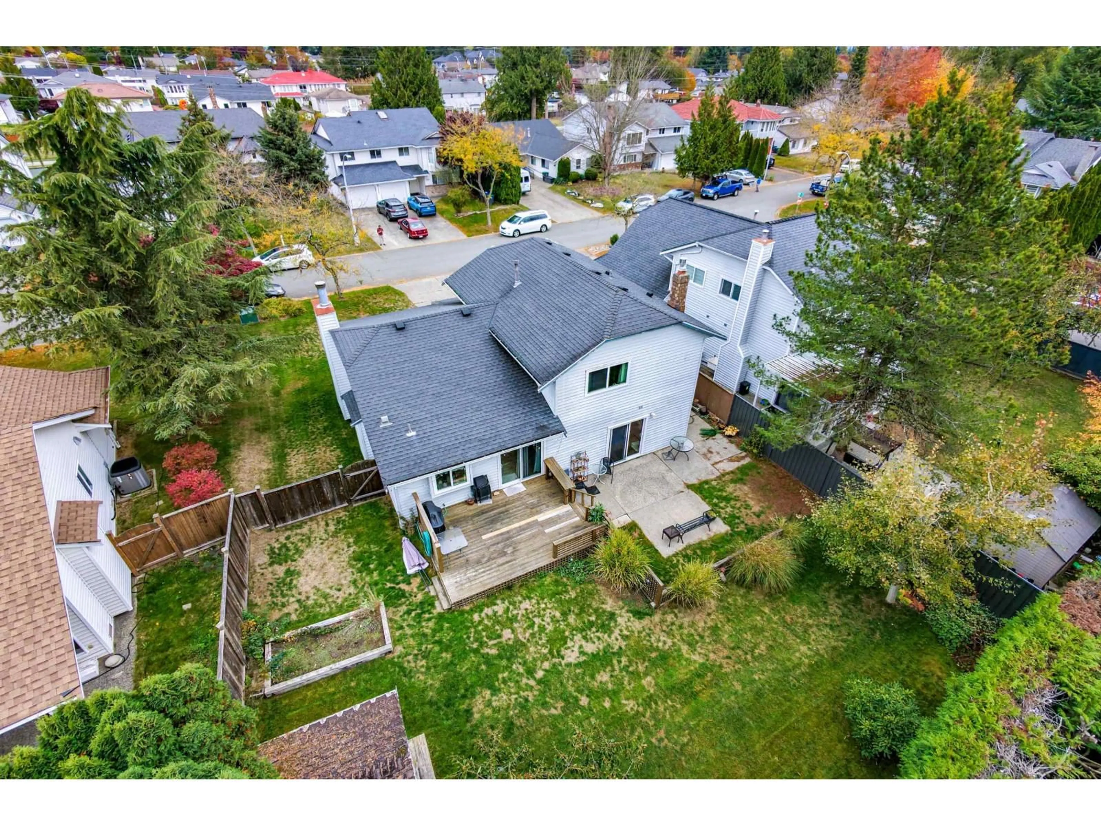 A pic from outside/outdoor area/front of a property/back of a property/a pic from drone, street for 15276 95 AVENUE, Surrey British Columbia V3R9C6