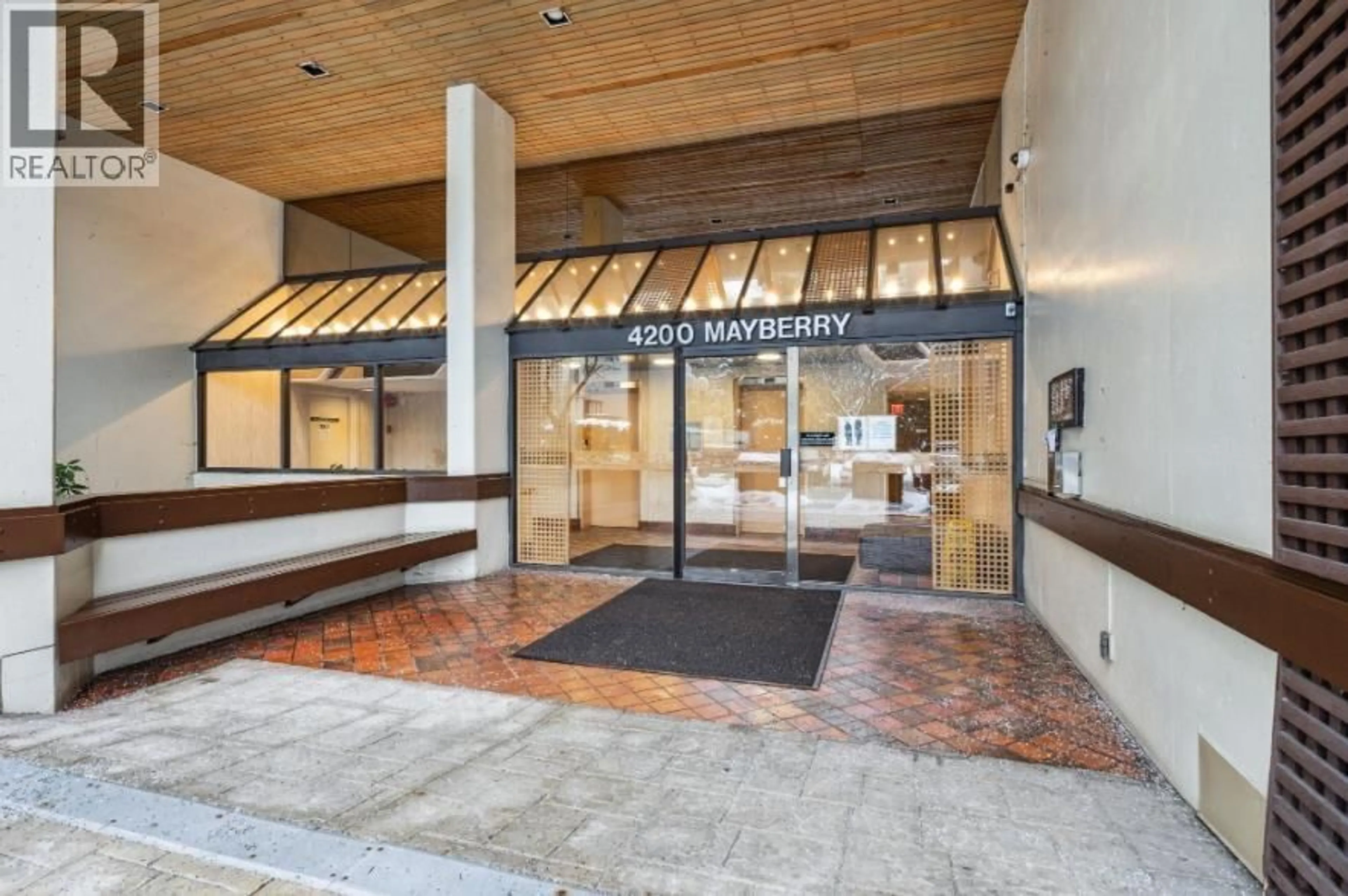 Indoor foyer for 406 - 4200 MAYBERRY STREET, Burnaby British Columbia V5H4A7