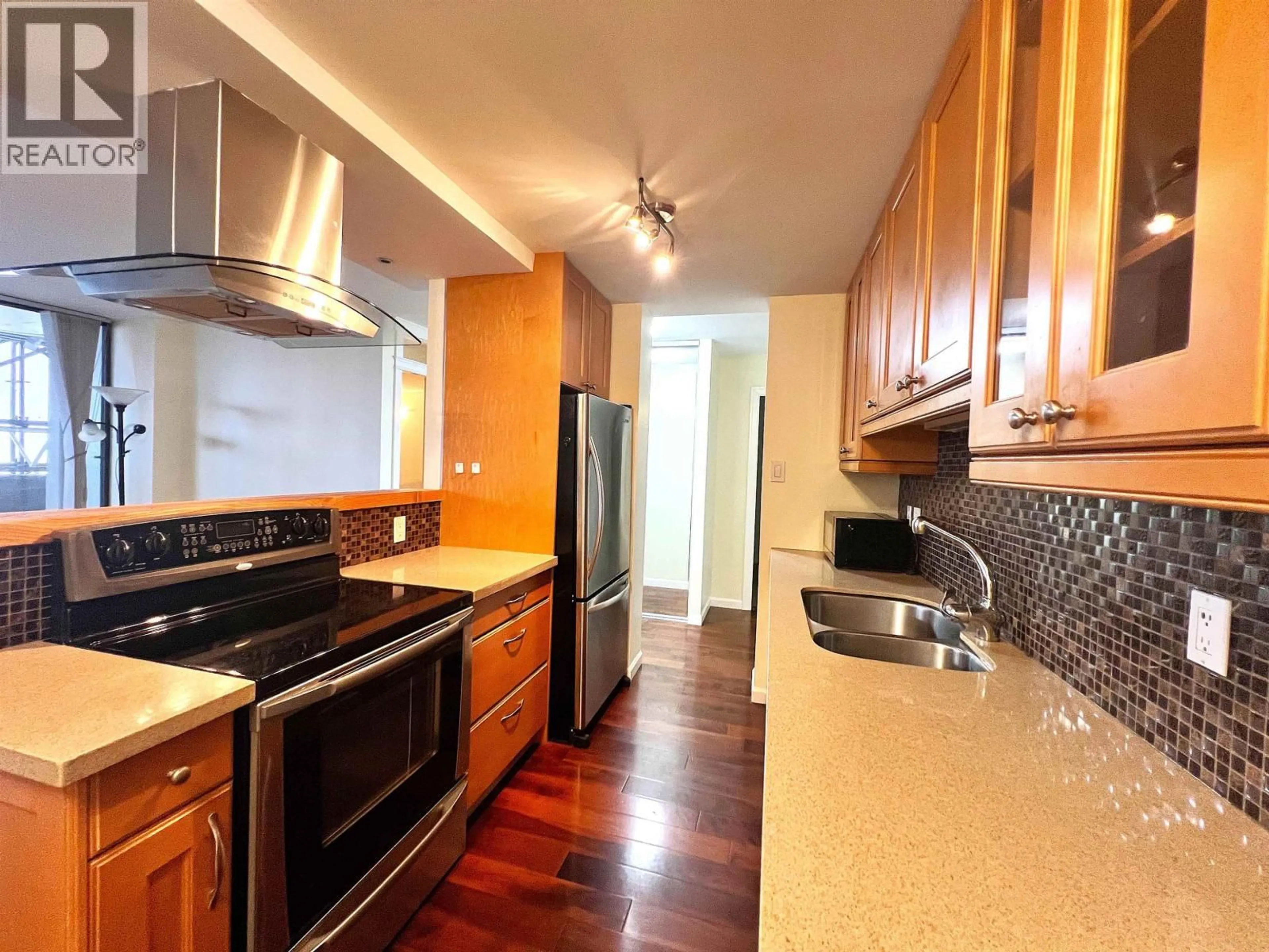 Standard kitchen, wood/laminate floor for 406 - 4200 MAYBERRY STREET, Burnaby British Columbia V5H4A7