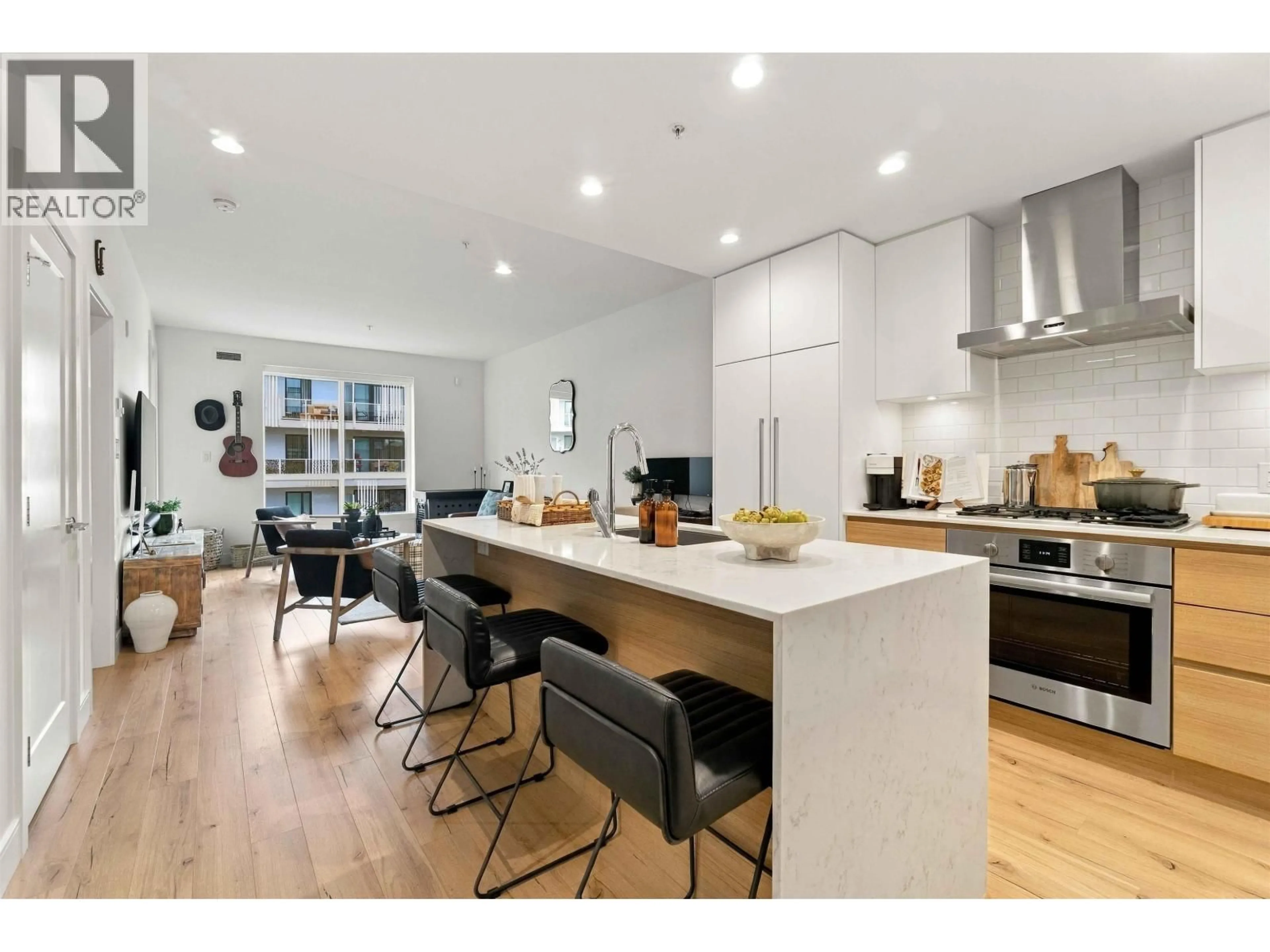 Open concept kitchen, wood/laminate floor for 412 - 3131 MURRAY STREET, Port Moody British Columbia V3H0L9