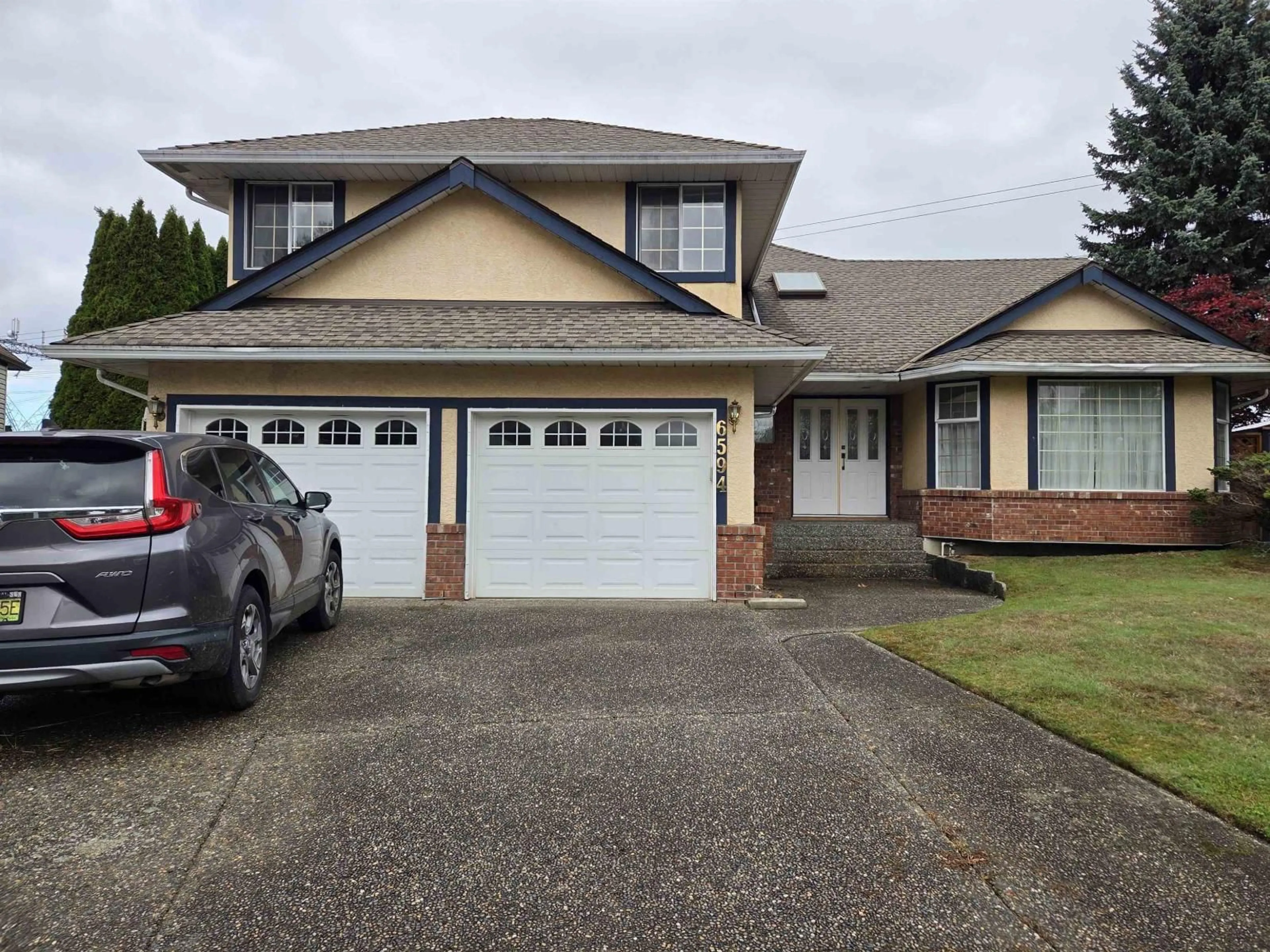 Home with vinyl exterior material, street for 6594 179 STREET, Surrey British Columbia V3S7J8