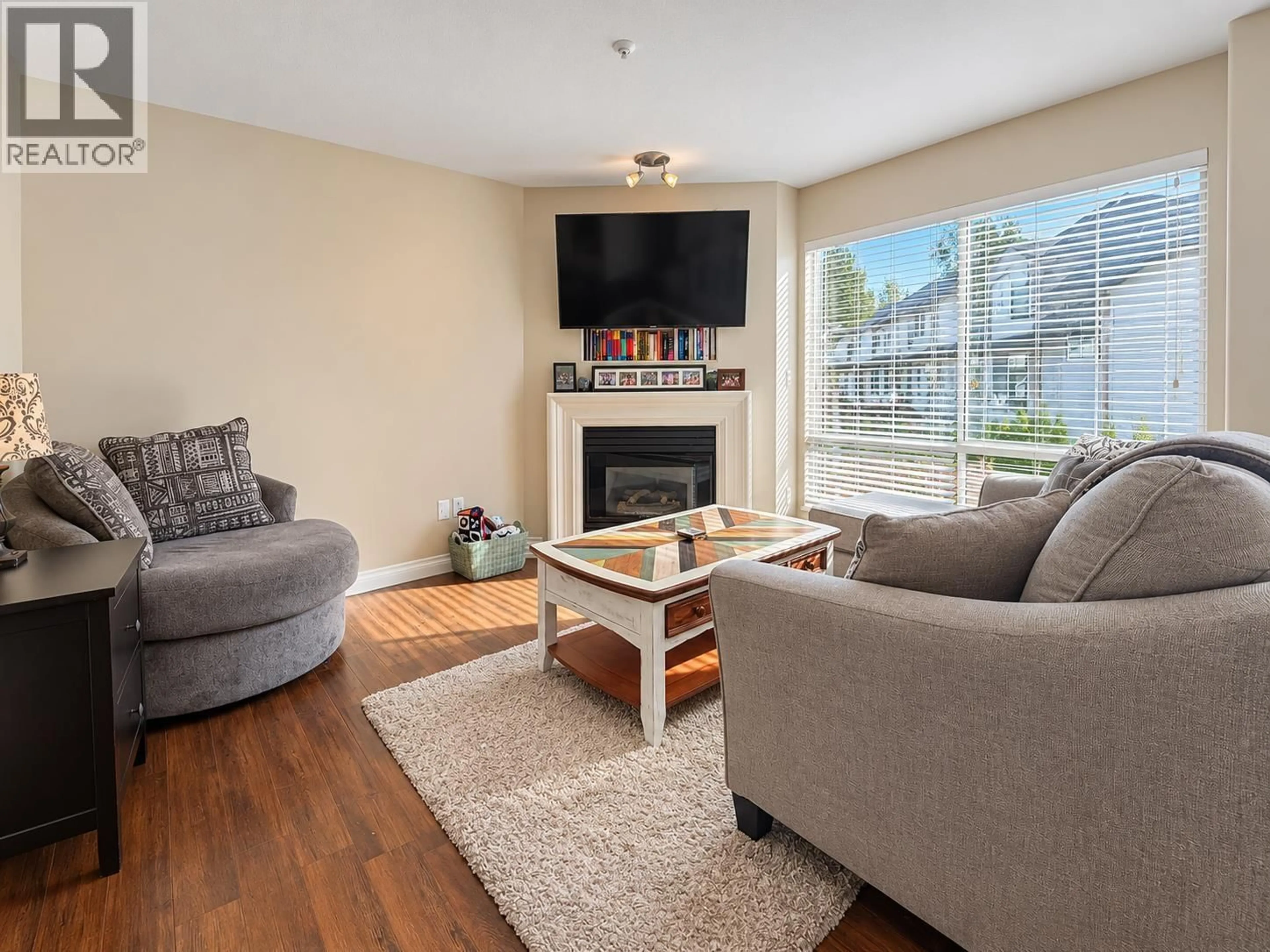 Living room with furniture, wood/laminate floor for 35 - 2450 LOBB AVENUE, Port Coquitlam British Columbia V3C6G8