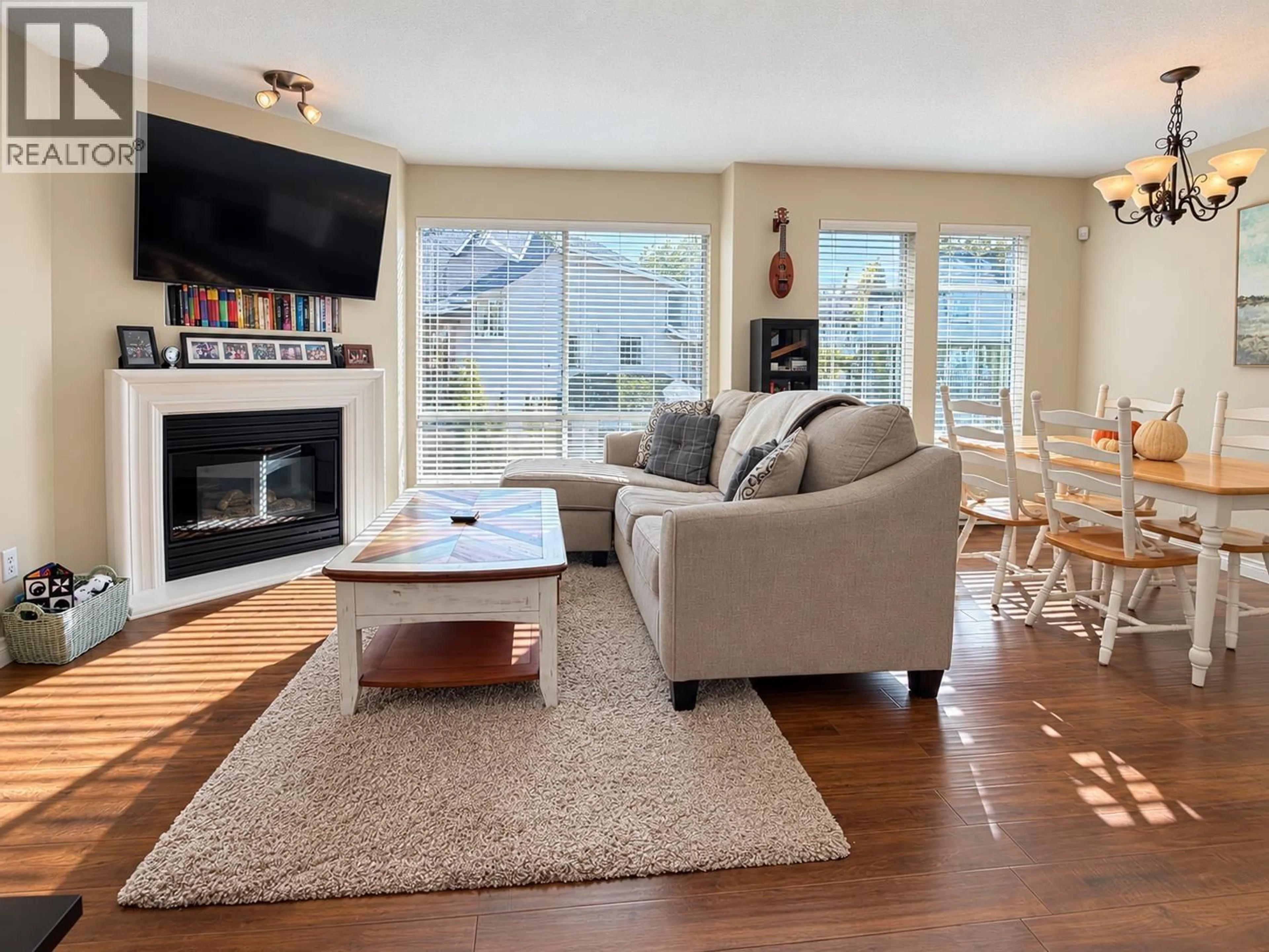Living room with furniture, wood/laminate floor for 35 - 2450 LOBB AVENUE, Port Coquitlam British Columbia V3C6G8