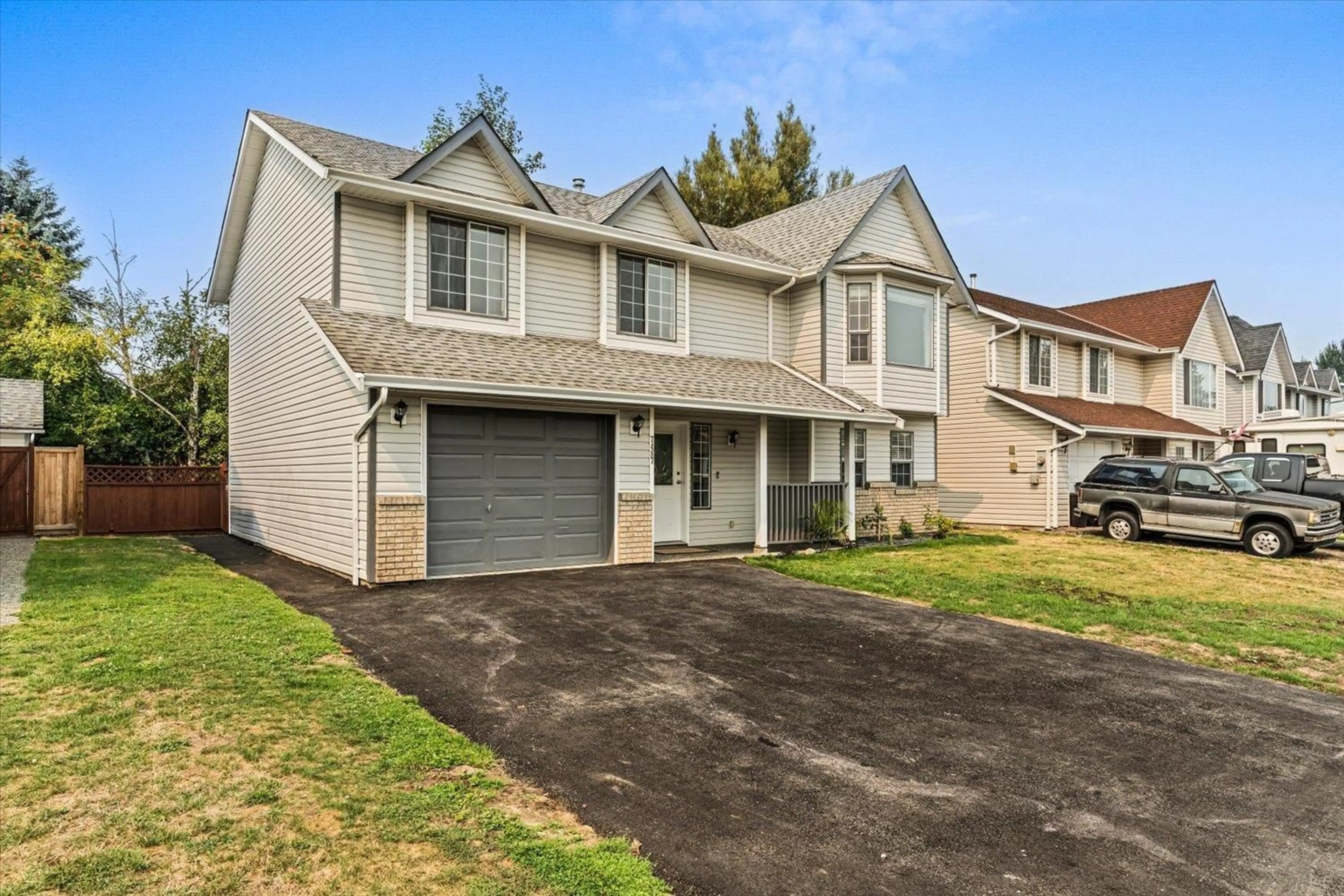 Home with vinyl exterior material, street for 7487 GARNET DRIVE, Chilliwack British Columbia V2R3B1