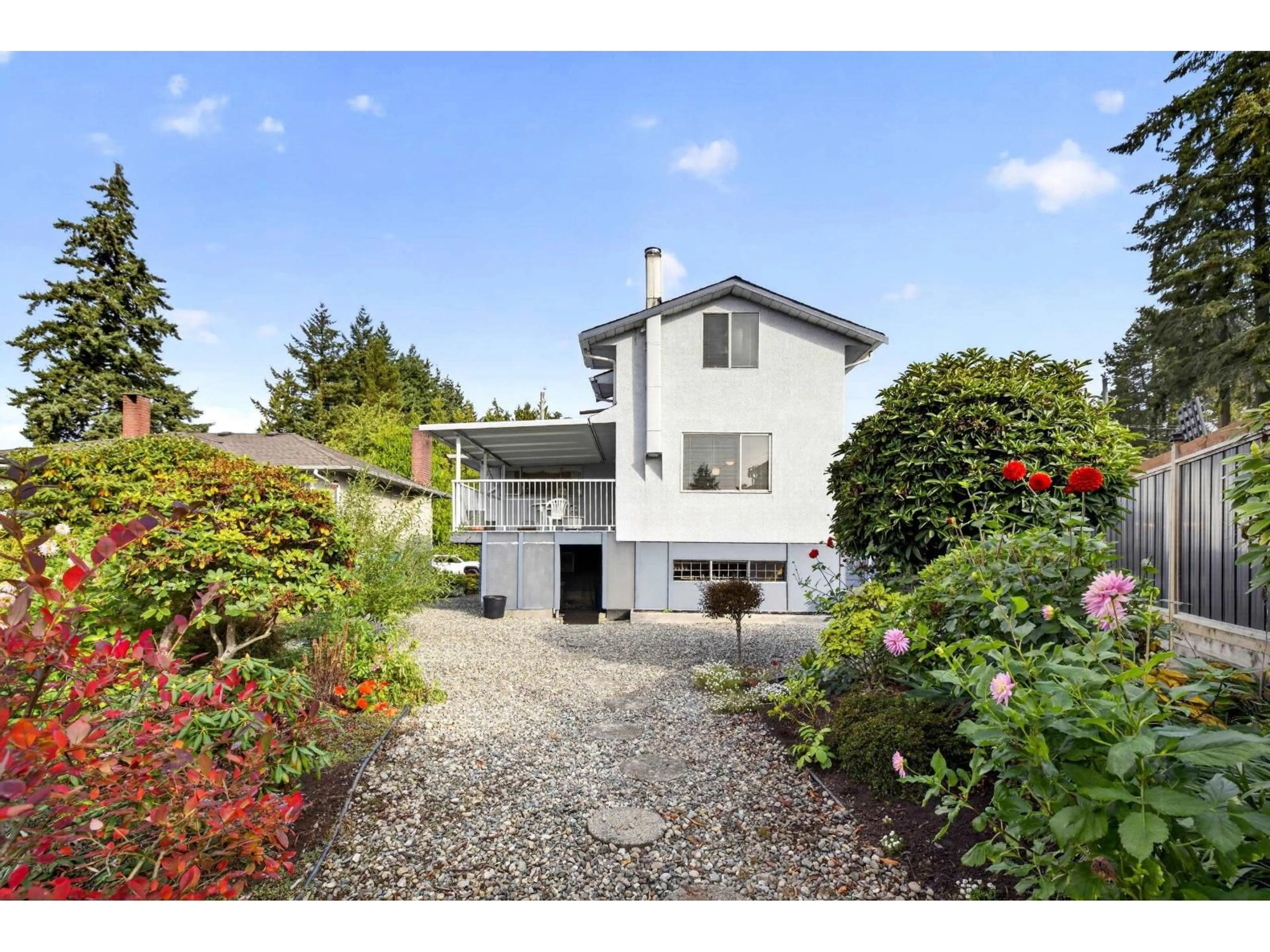 A pic from outside/outdoor area/front of a property/back of a property/a pic from drone, street for 12614 102 AVENUE, Surrey British Columbia V3V3E4