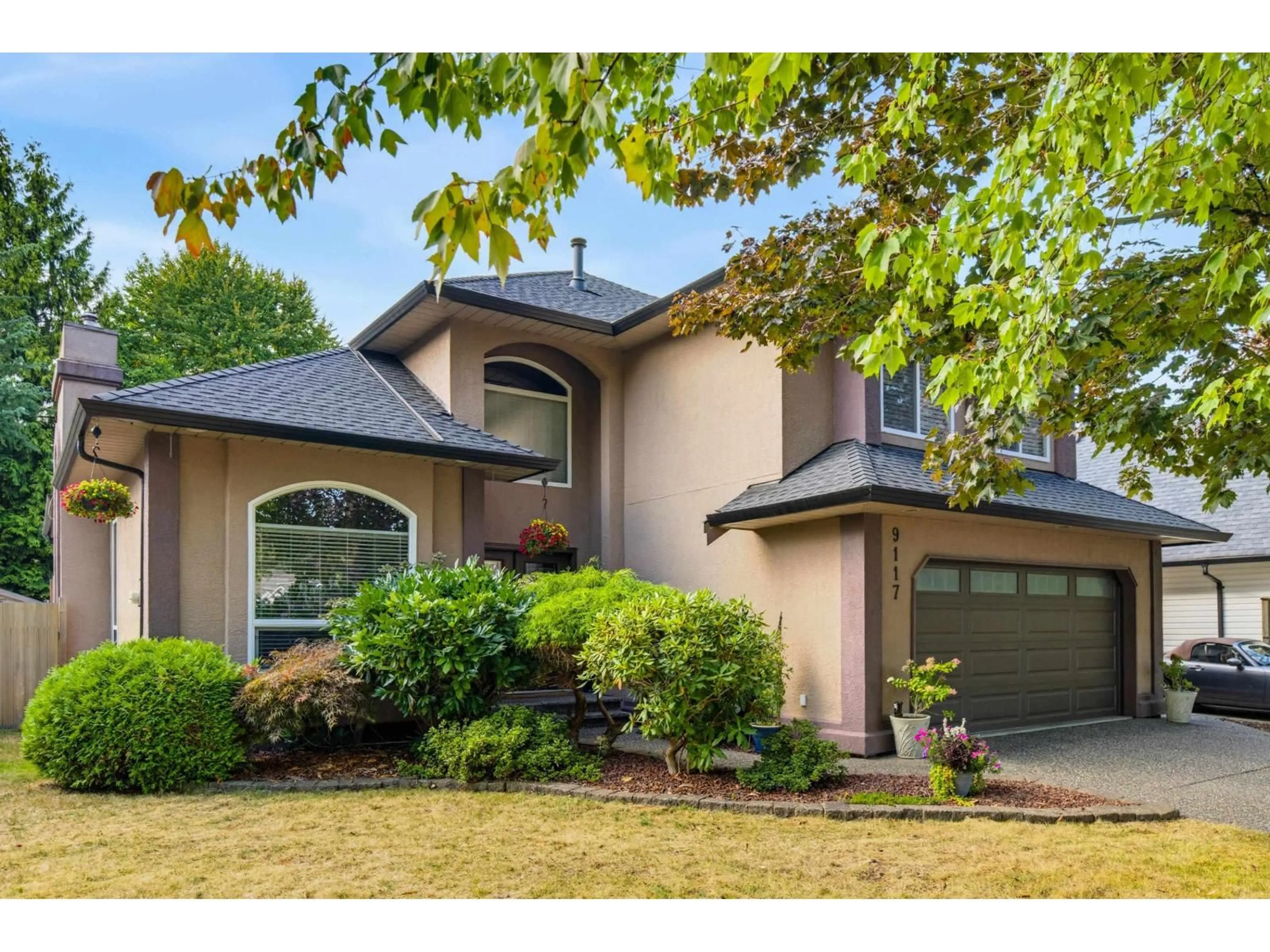 Home with vinyl exterior material, street for 9117 207B STREET, Langley British Columbia V1M2P5