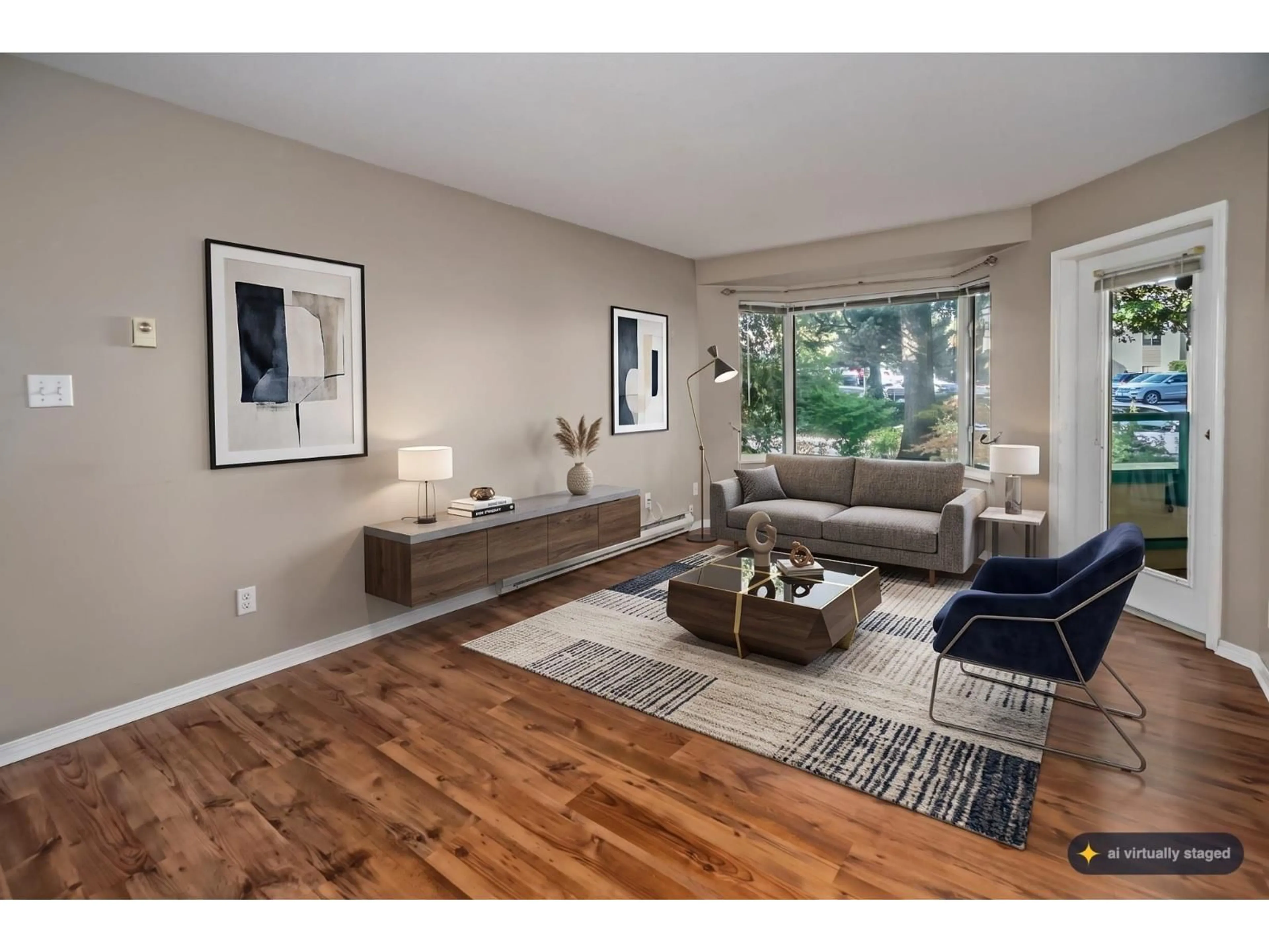 Living room with furniture, wood/laminate floor for 206 - 33165 OLD YALE ROAD, Abbotsford British Columbia V2S2J4