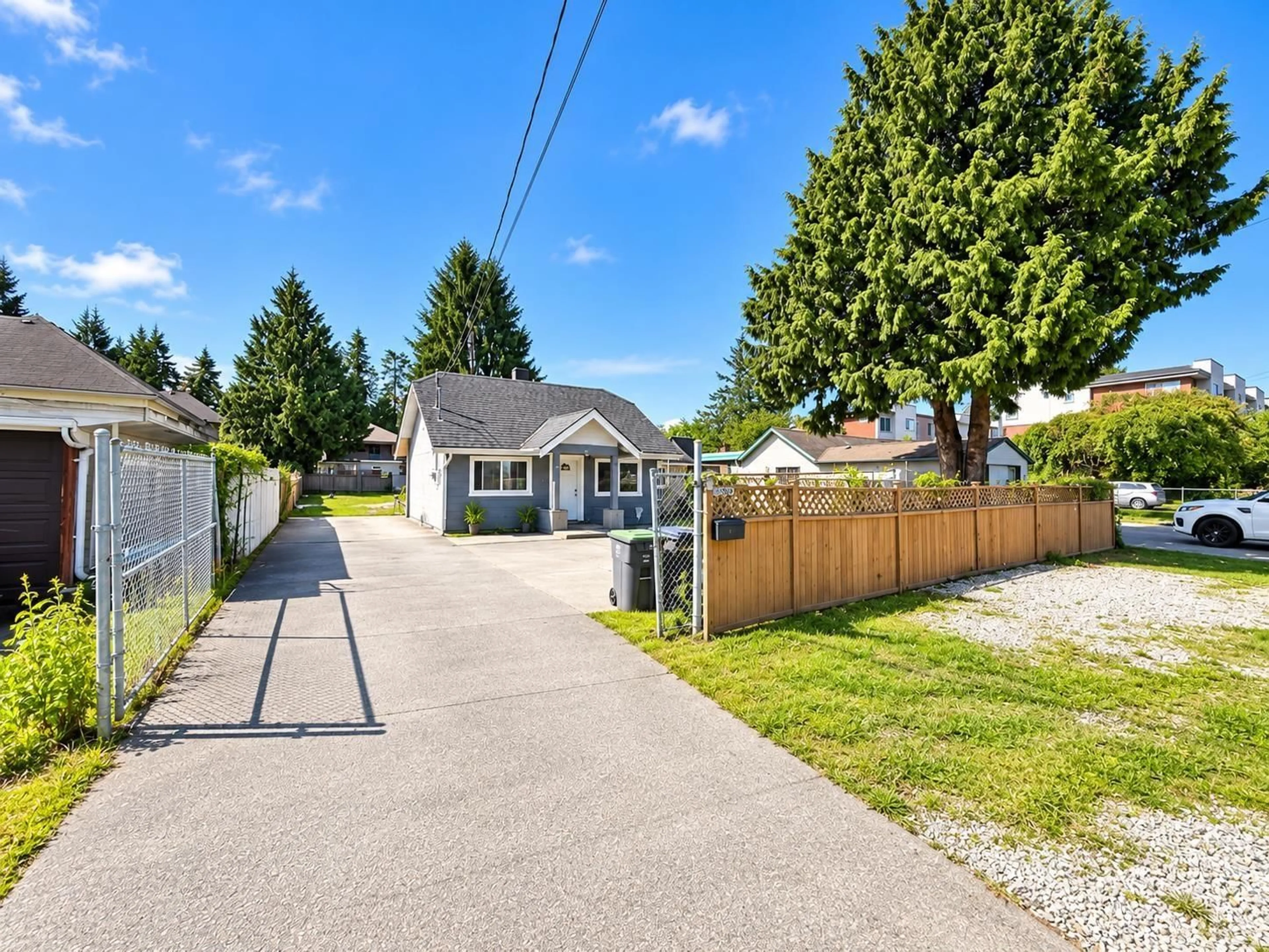 A pic from outside/outdoor area/front of a property/back of a property/a pic from drone, street for 13370 96 AVENUE, Surrey British Columbia V3V1Y4