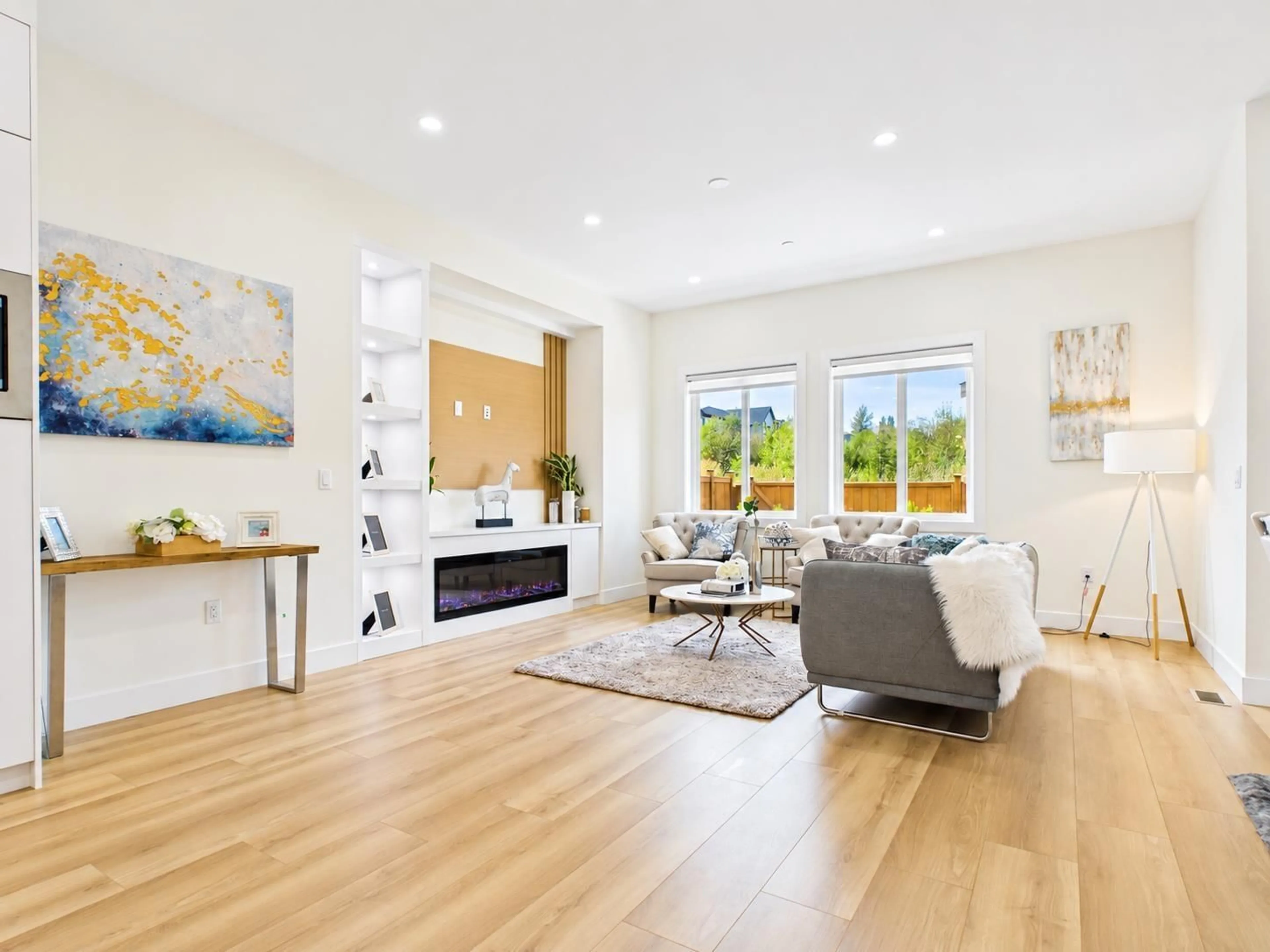 Living room with furniture, wood/laminate floor for 7695 197 ST STREET, Langley British Columbia V2Y3T4