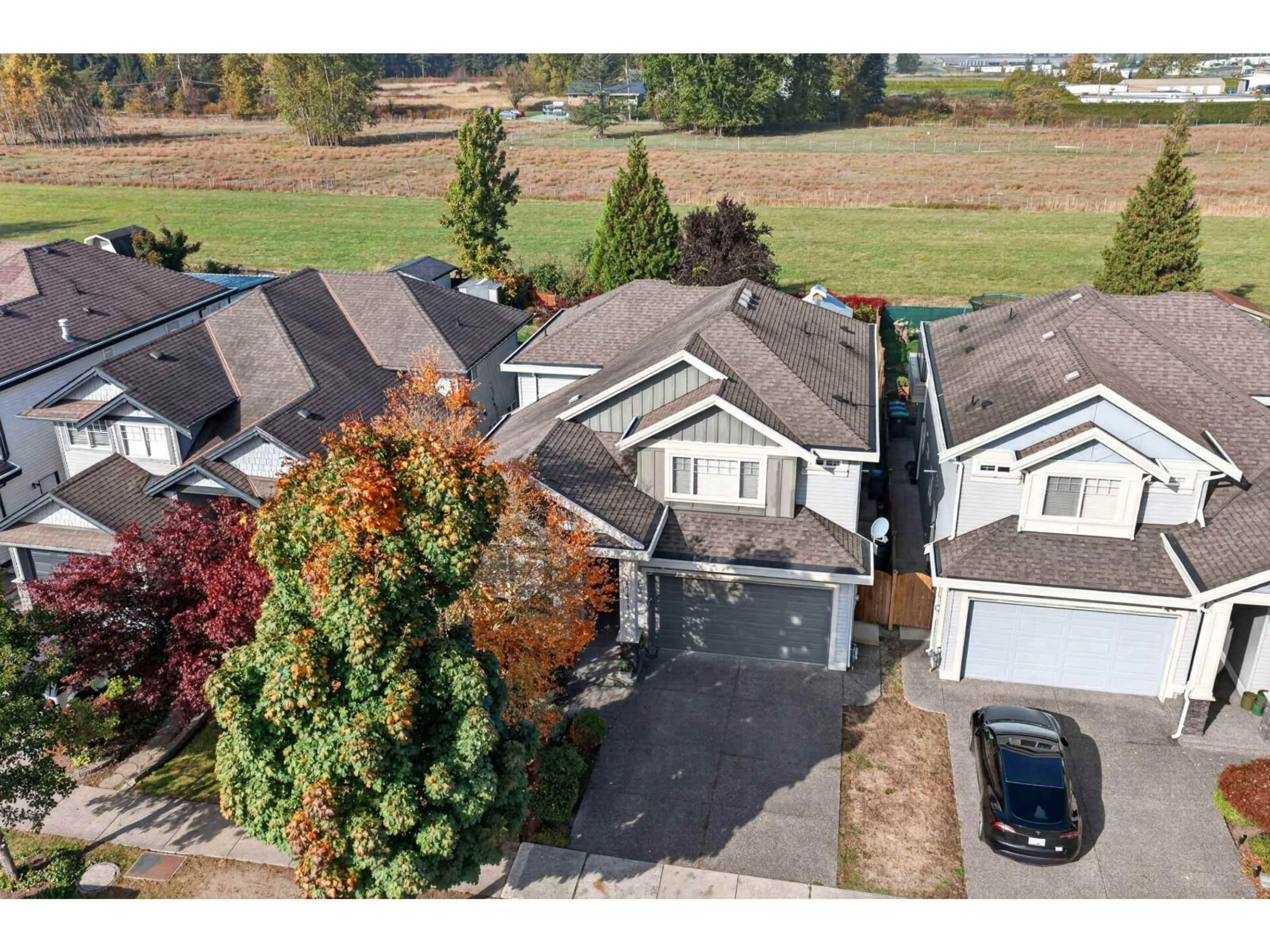 A pic from outside/outdoor area/front of a property/back of a property/a pic from drone, street for 17473 64A AVENUE, Surrey British Columbia V3S3K9