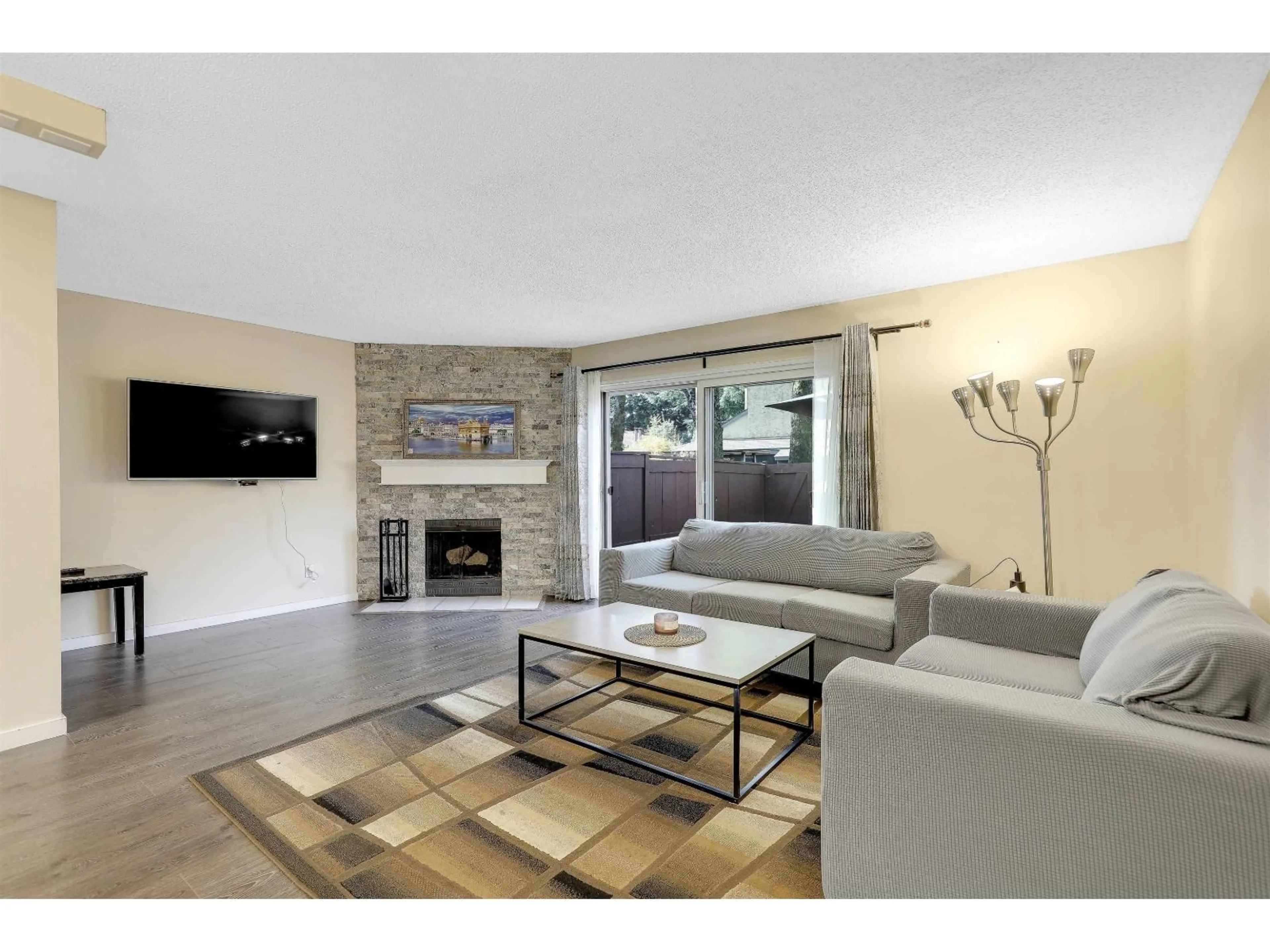 Living room with furniture, unknown for 227 - 9460 PRINCE CHARLES BOULEVARD, Surrey British Columbia V3V1S6