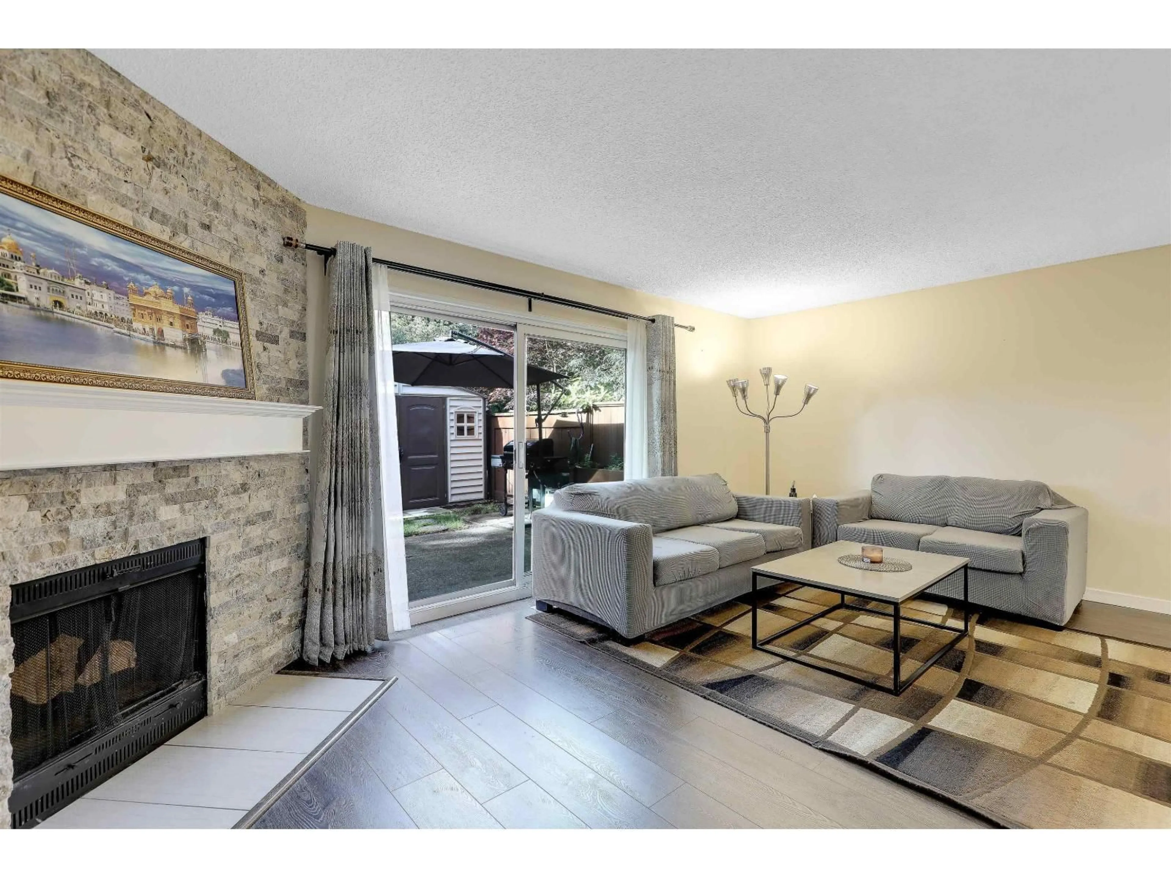 Living room with furniture, unknown for 227 - 9460 PRINCE CHARLES BOULEVARD, Surrey British Columbia V3V1S6