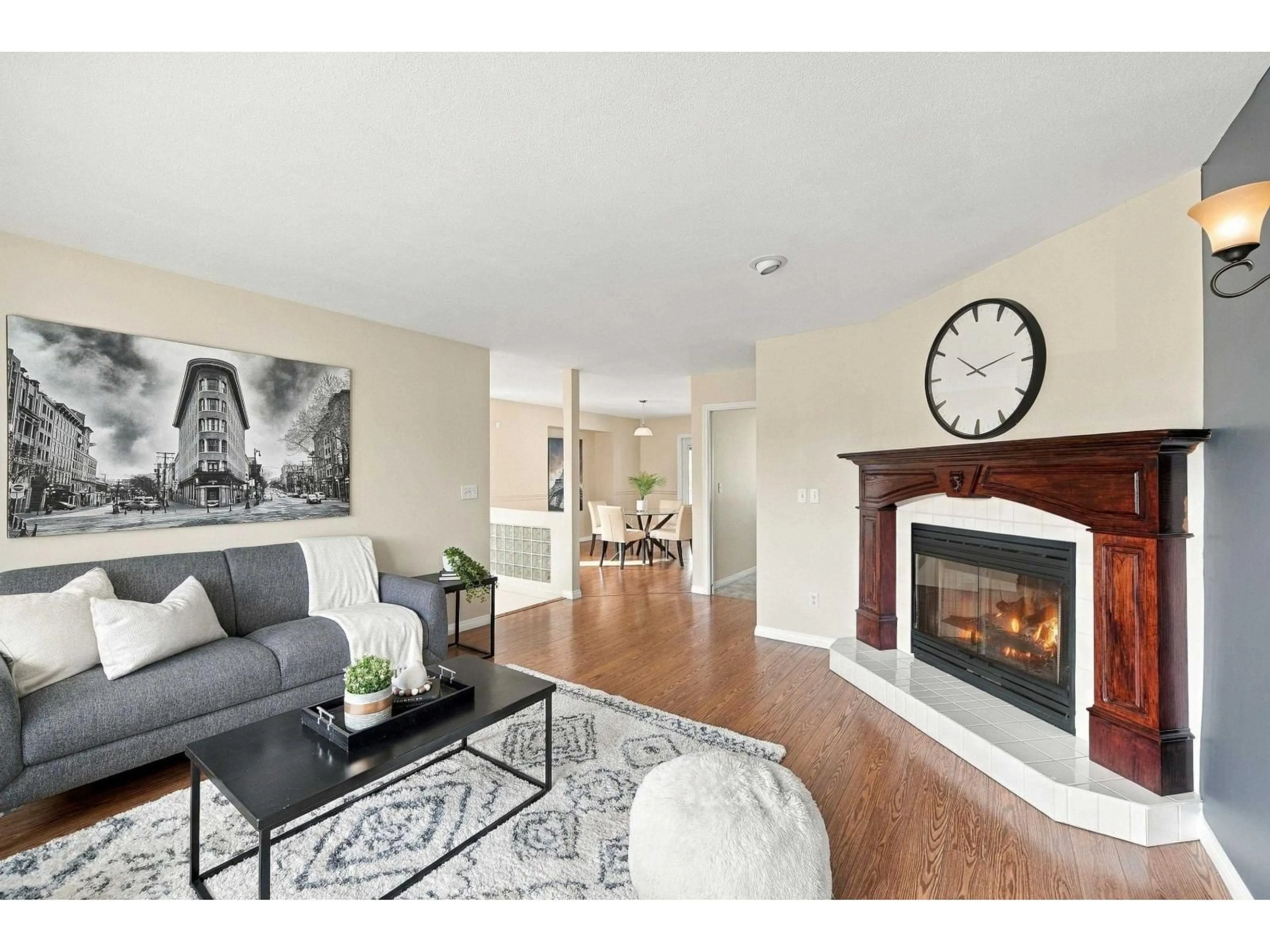 Living room with furniture, wood/laminate floor for 6375 187A STREET, Surrey British Columbia V3S7W2