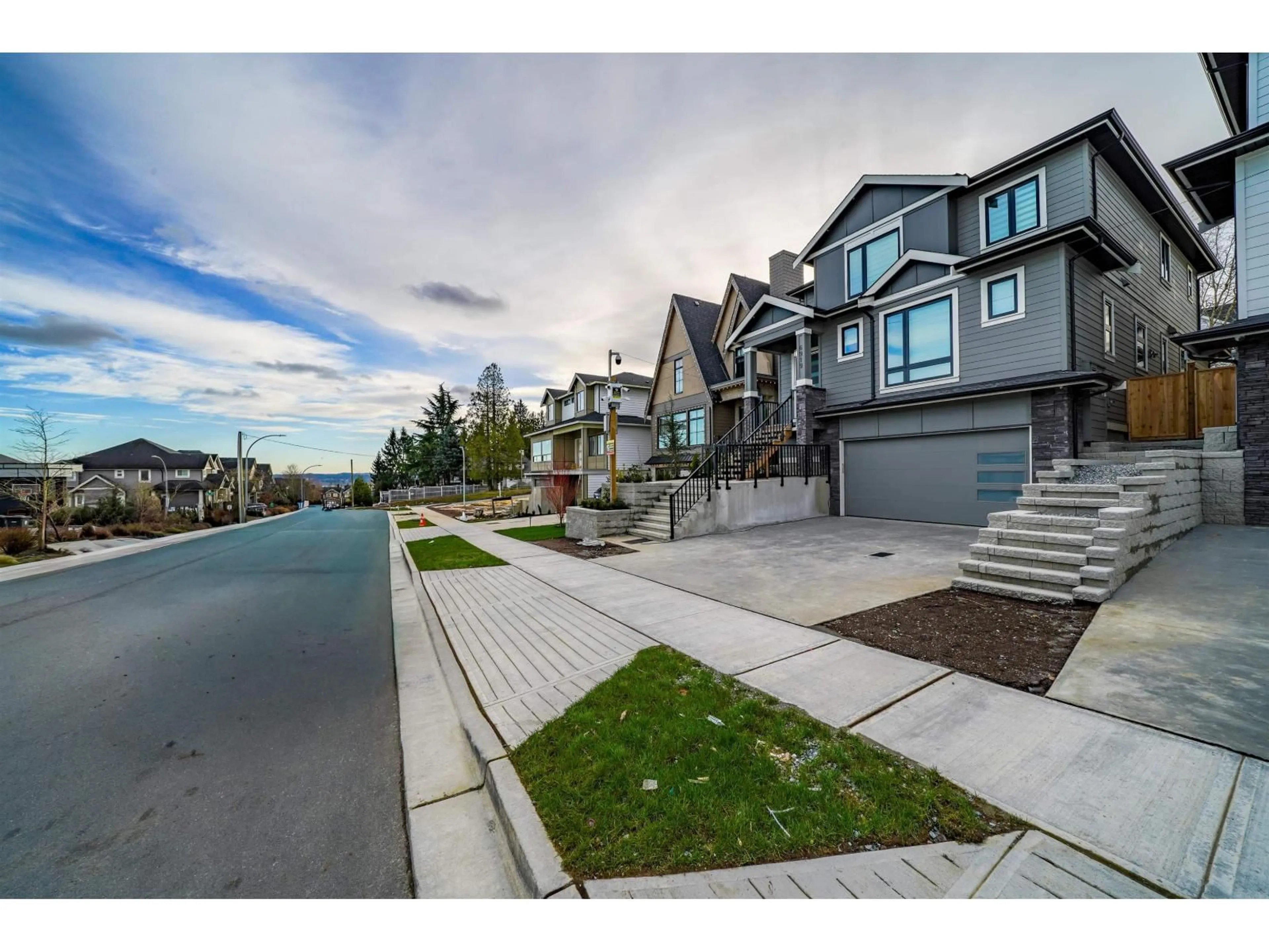 A pic from outside/outdoor area/front of a property/back of a property/a pic from drone, street for 6919 205 STREET, Langley British Columbia V2Y1R2