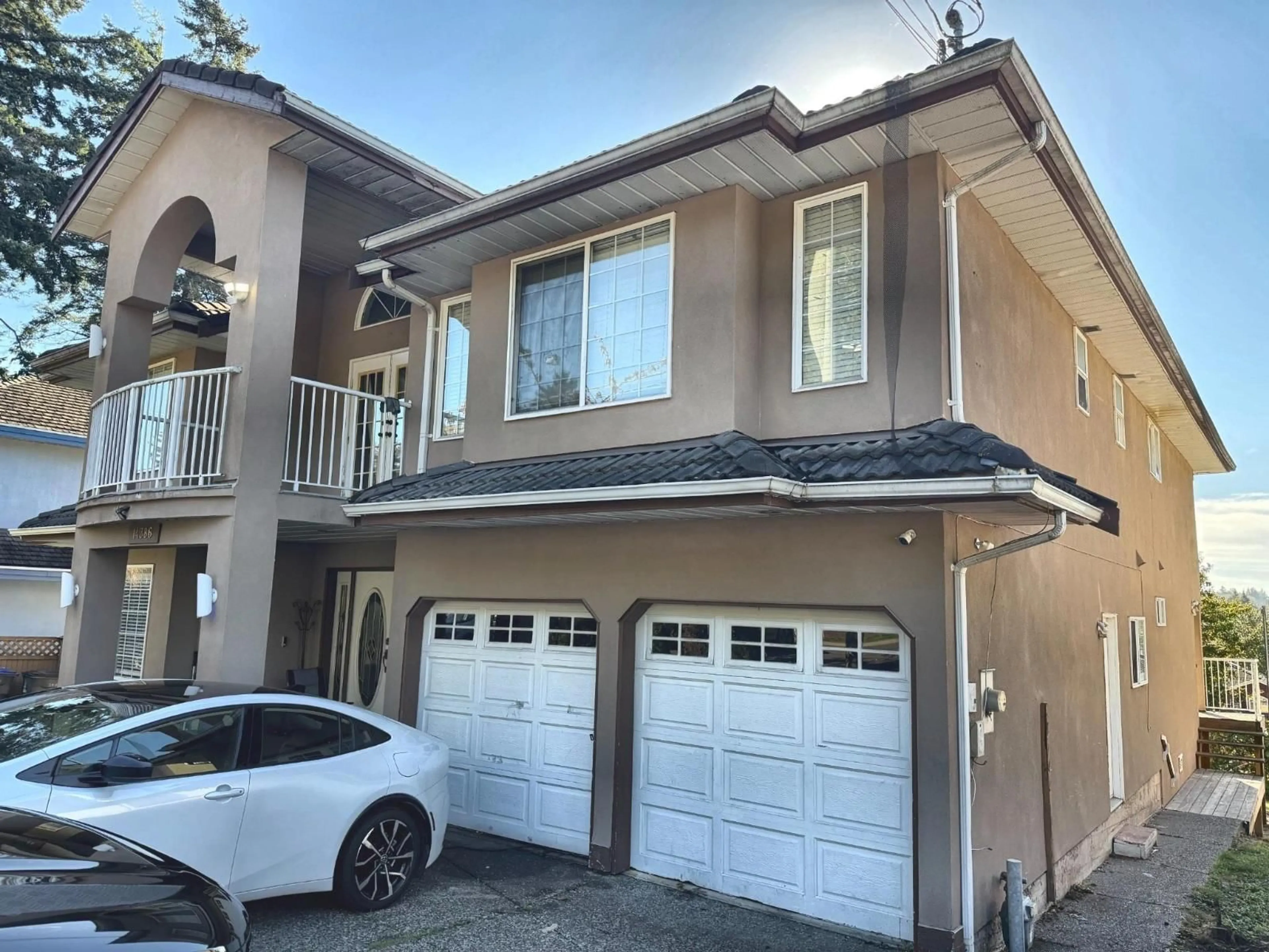 Home with vinyl exterior material, street for 14386 68 AVENUE, Surrey British Columbia V3W2H4