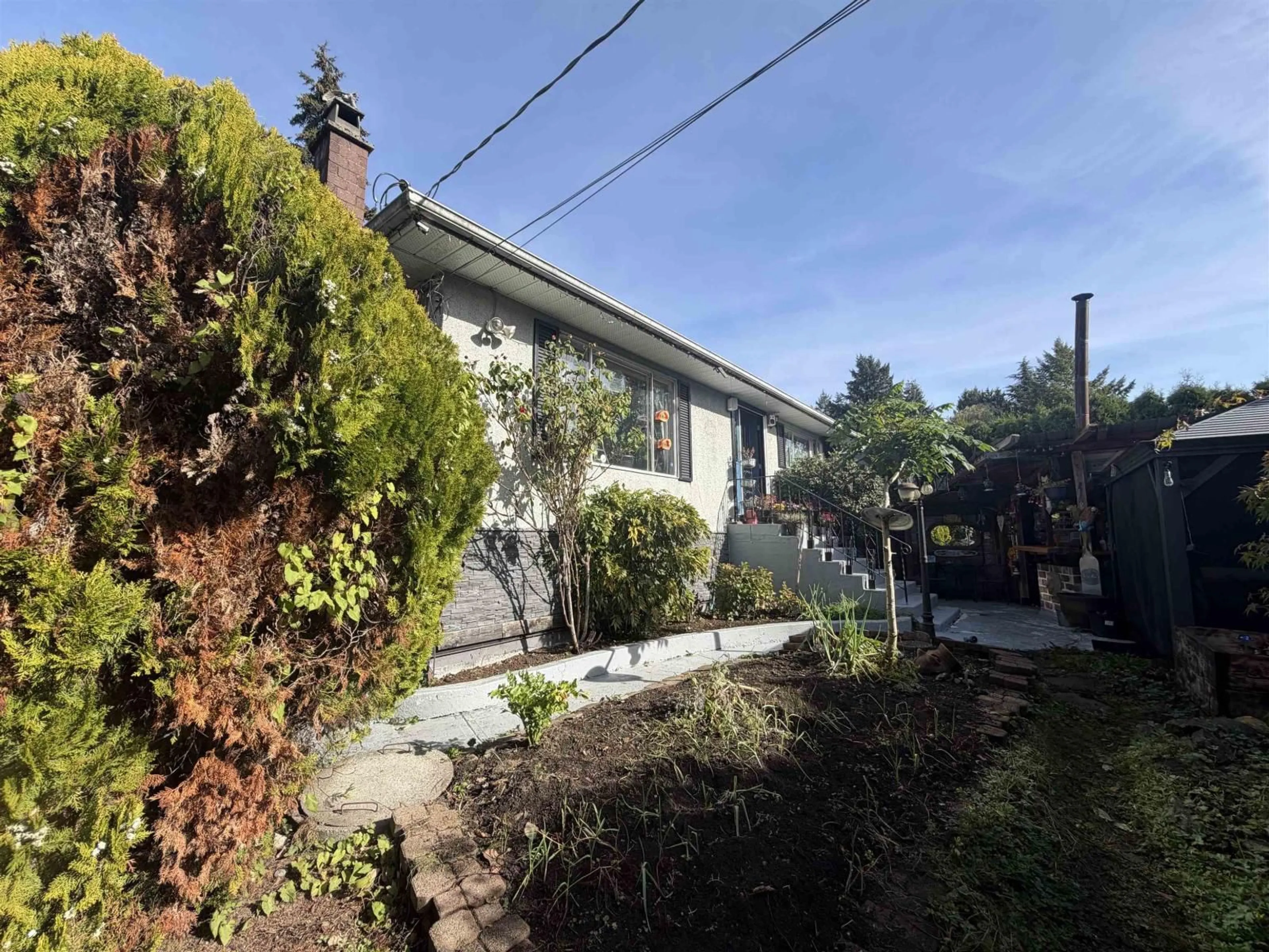 A pic from outside/outdoor area/front of a property/back of a property/a pic from drone, street for 12585 100 AVENUE, Surrey British Columbia V3V2X6