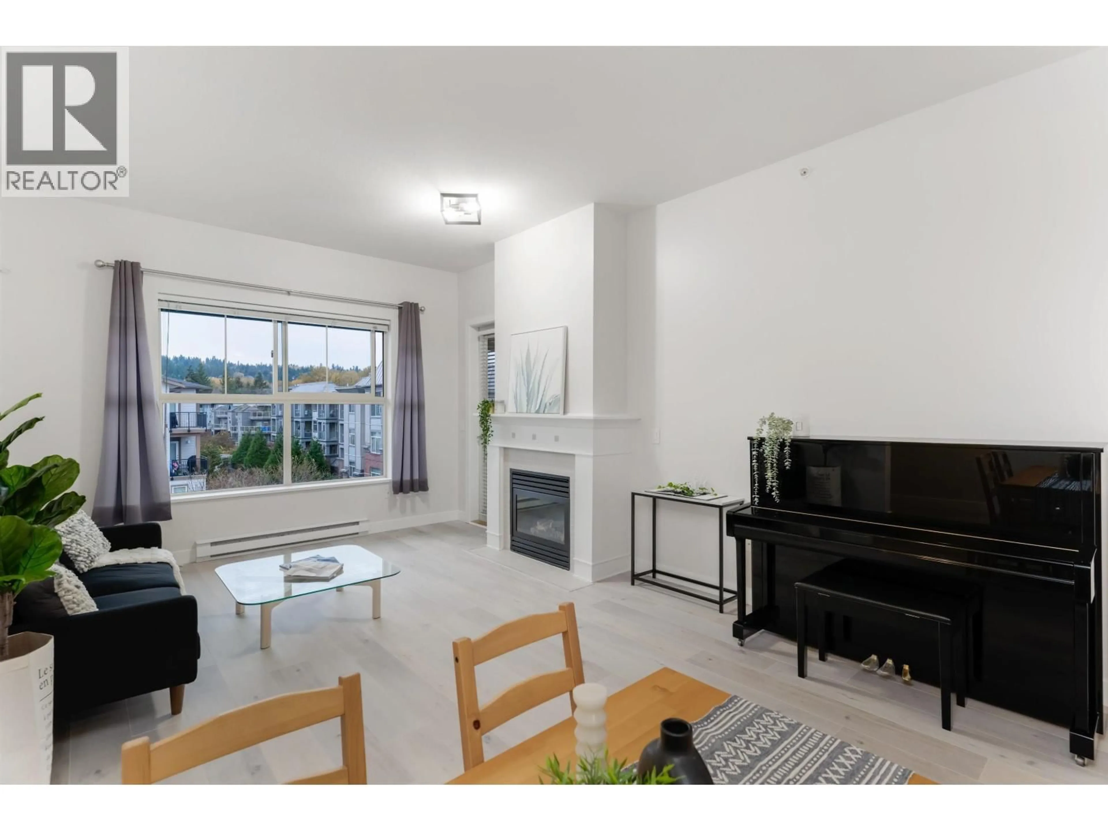 Living room with furniture, unknown for 402 - 2478 SHAUGHNESSY STREET, Port Coquitlam British Columbia V3C0A1