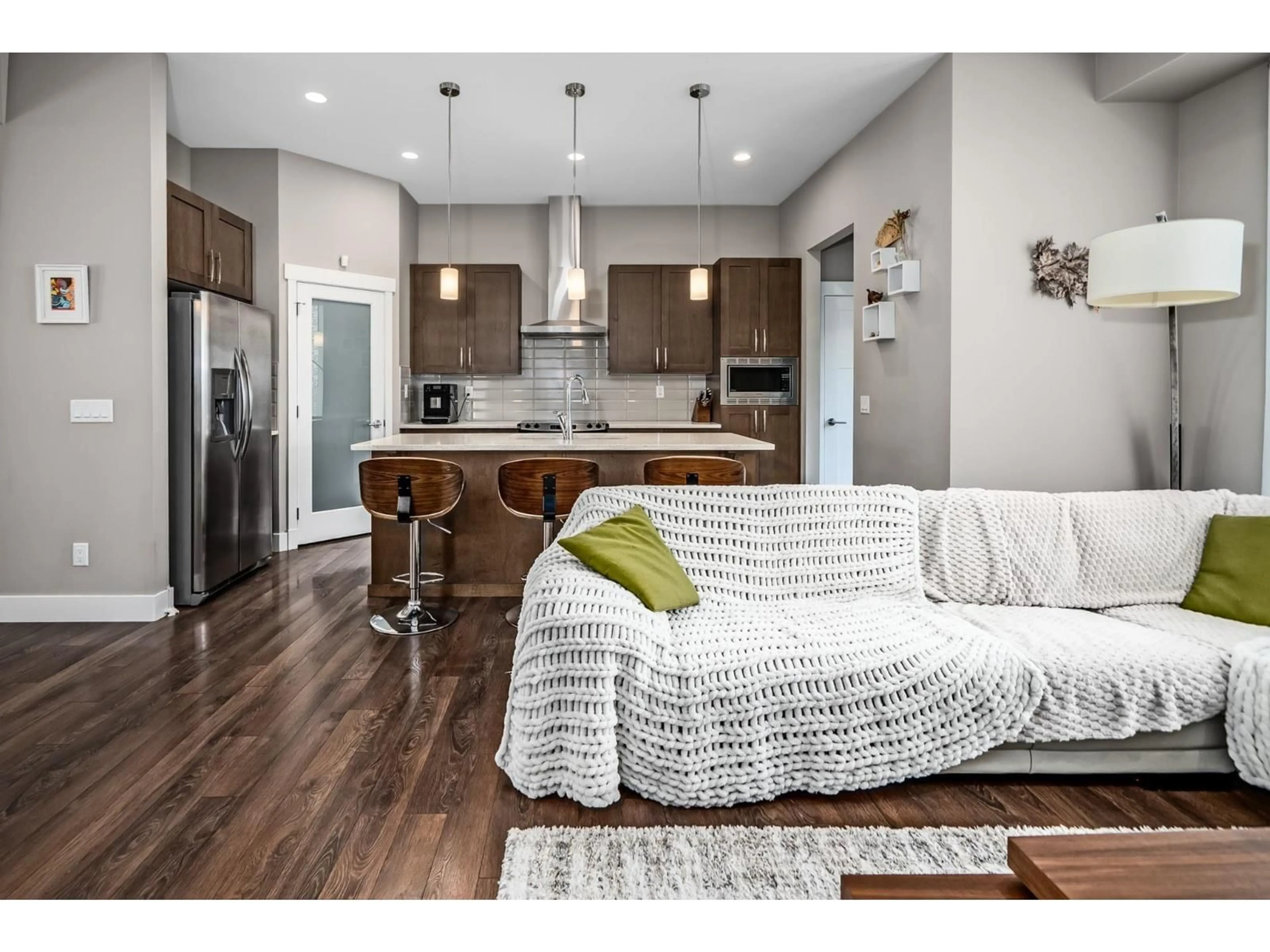 Open concept kitchen, wood/laminate floor for 20499 82 AVENUE, Langley British Columbia V2Y0S3