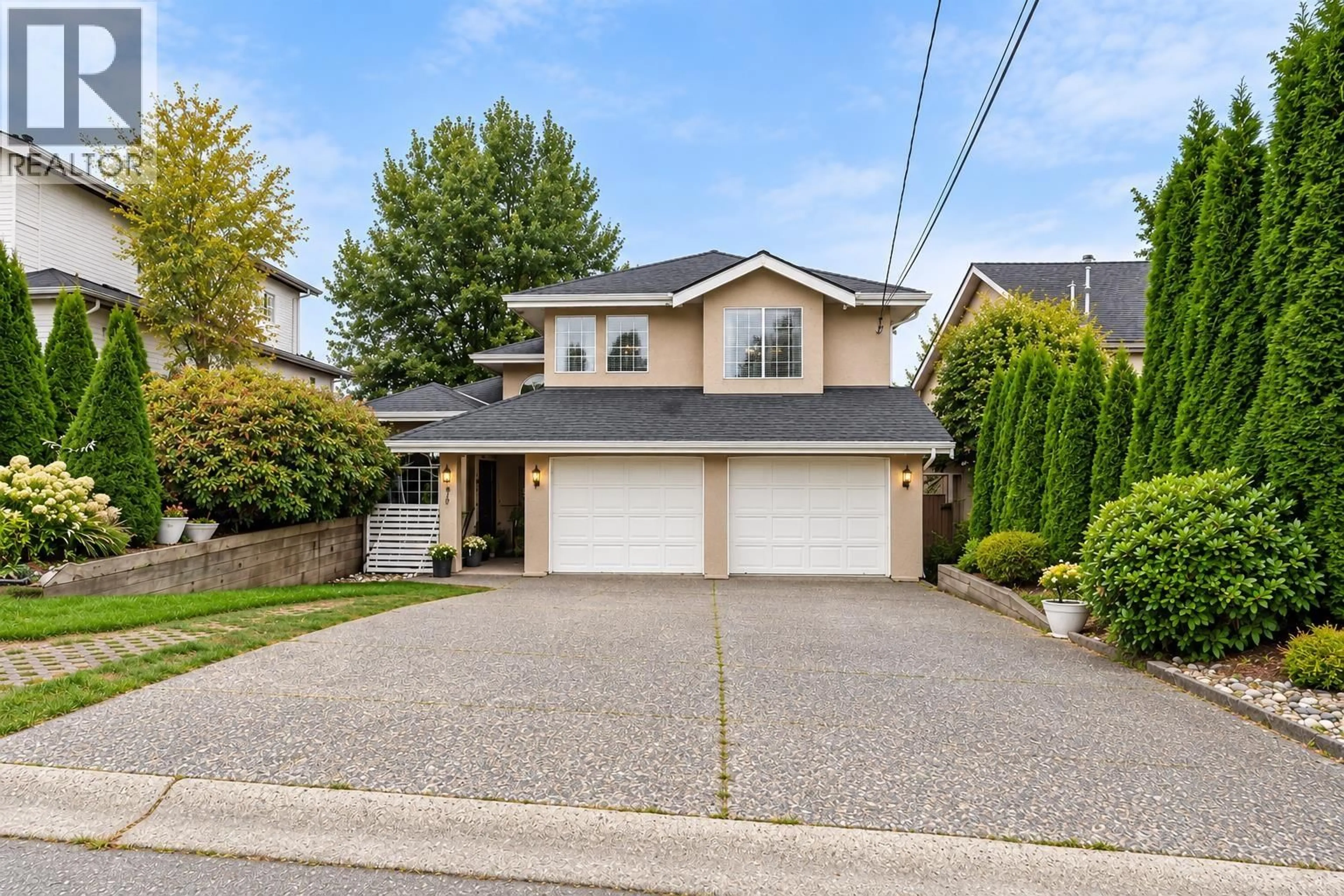 Home with vinyl exterior material, street for 1641 53A STREET, Delta British Columbia V4M3G3
