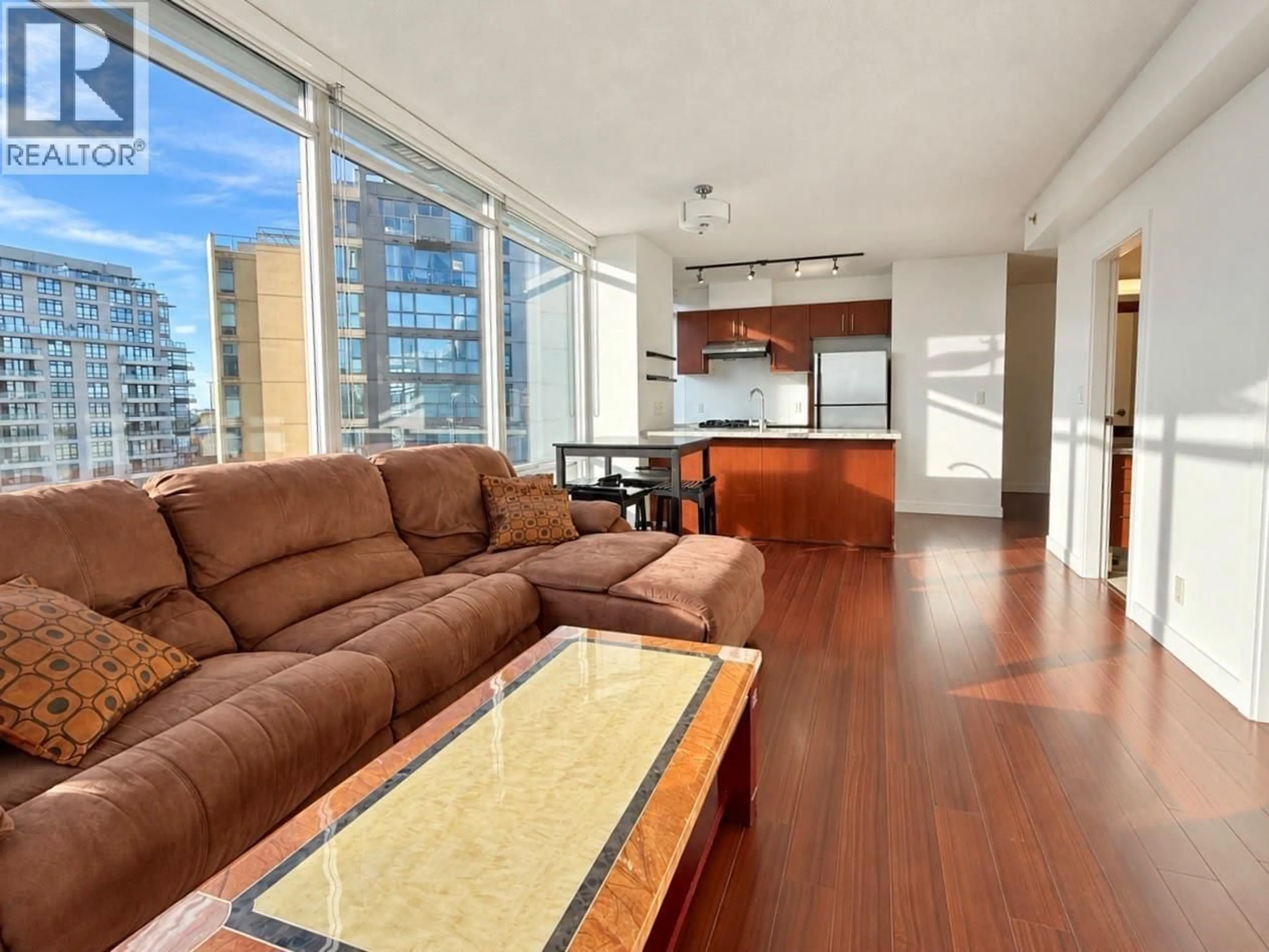 Living room with furniture, wood/laminate floor for 1008 - 8280 LANSDOWNE ROAD, Richmond British Columbia V6X0B2