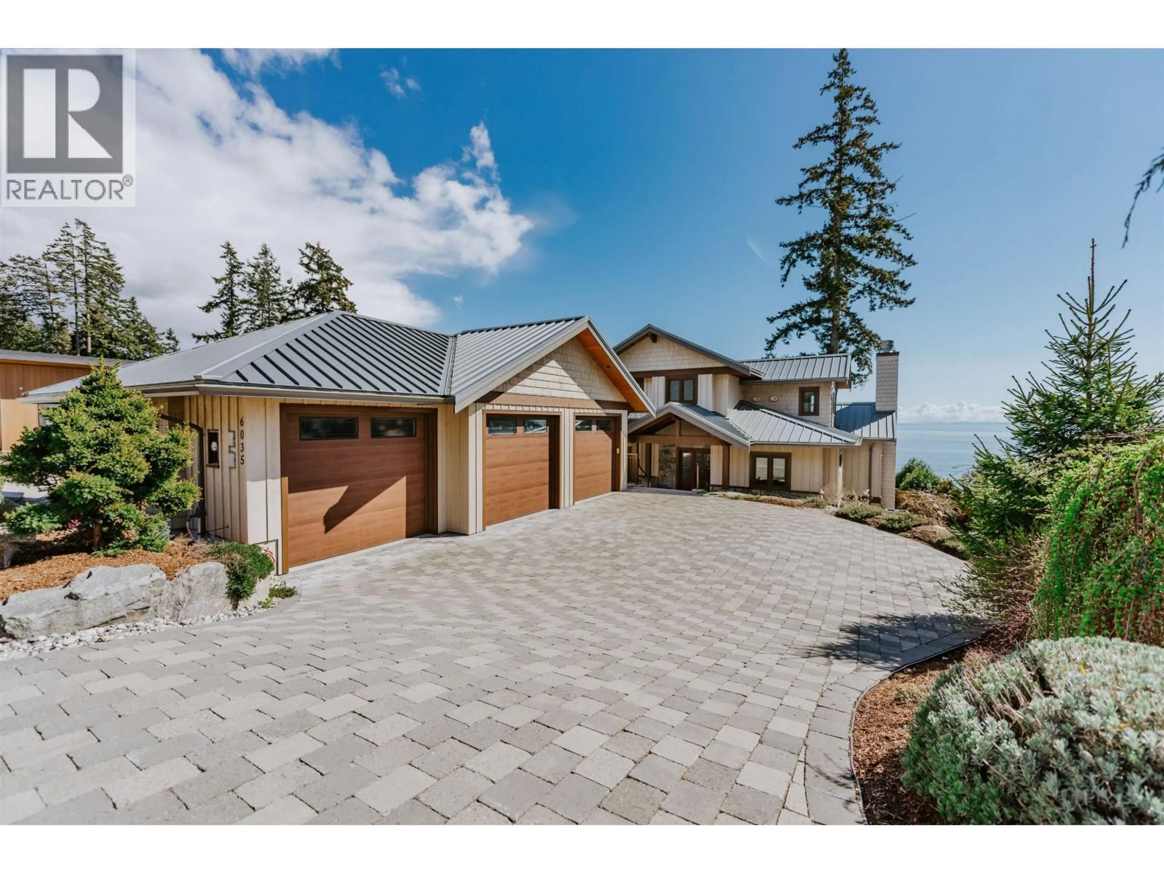 A pic from outside/outdoor area/front of a property/back of a property/a pic from drone, mountain view for 6035 SILVERSTONE LANE, Sechelt British Columbia V7Z0T8