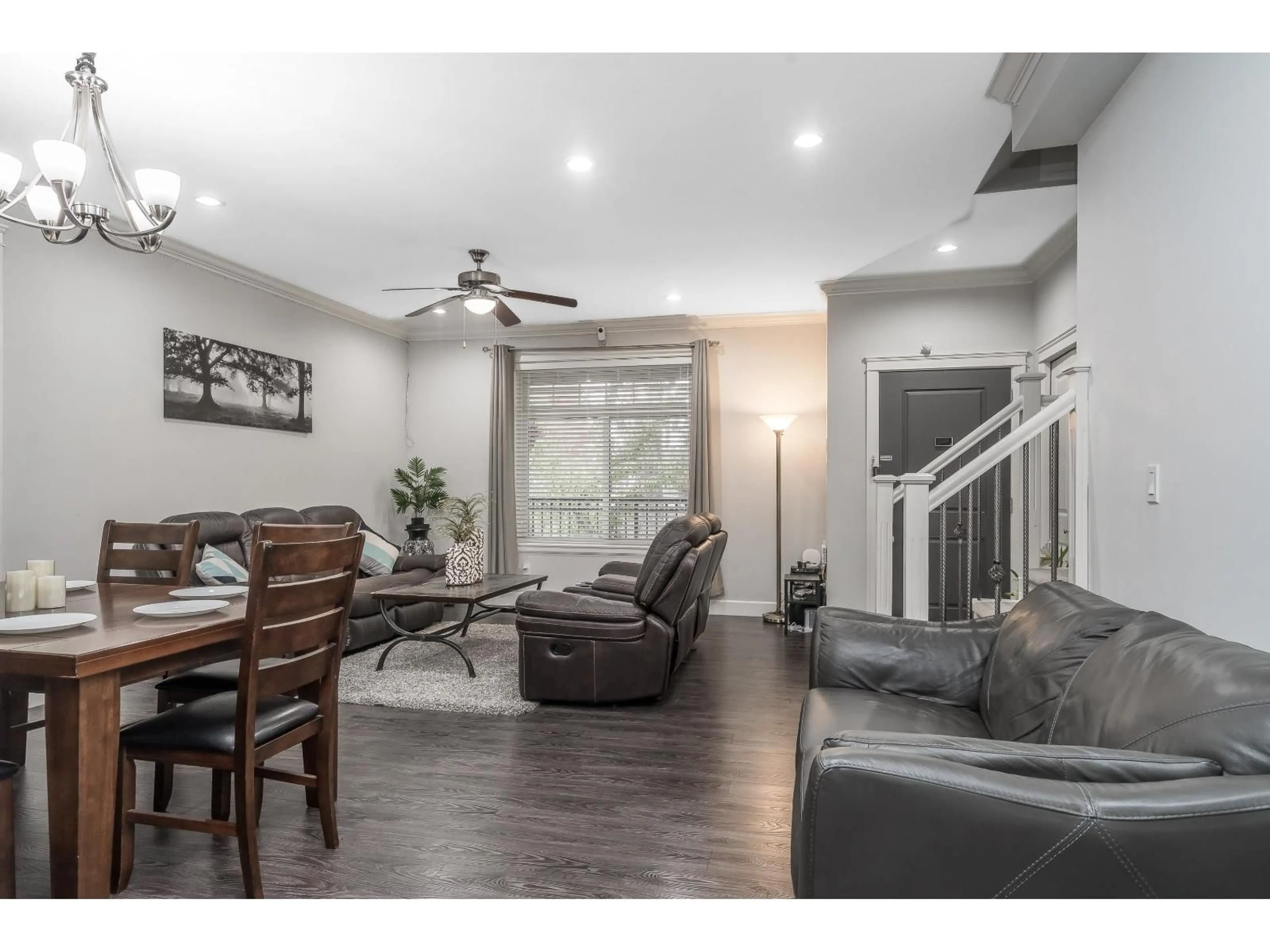 Living room with furniture, wood/laminate floor for 5938 128 STREET, Surrey British Columbia V3X1T3