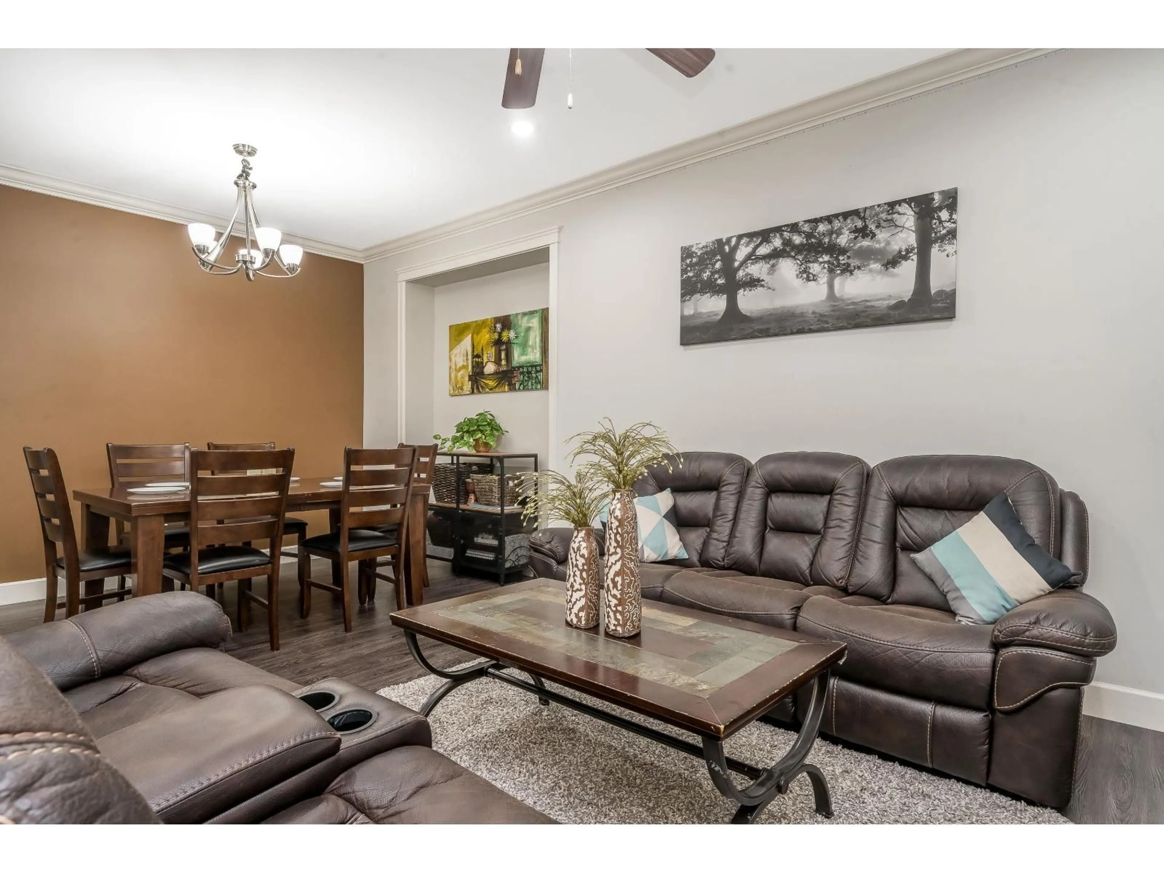 Living room with furniture, wood/laminate floor for 5938 128 STREET, Surrey British Columbia V3X1T3