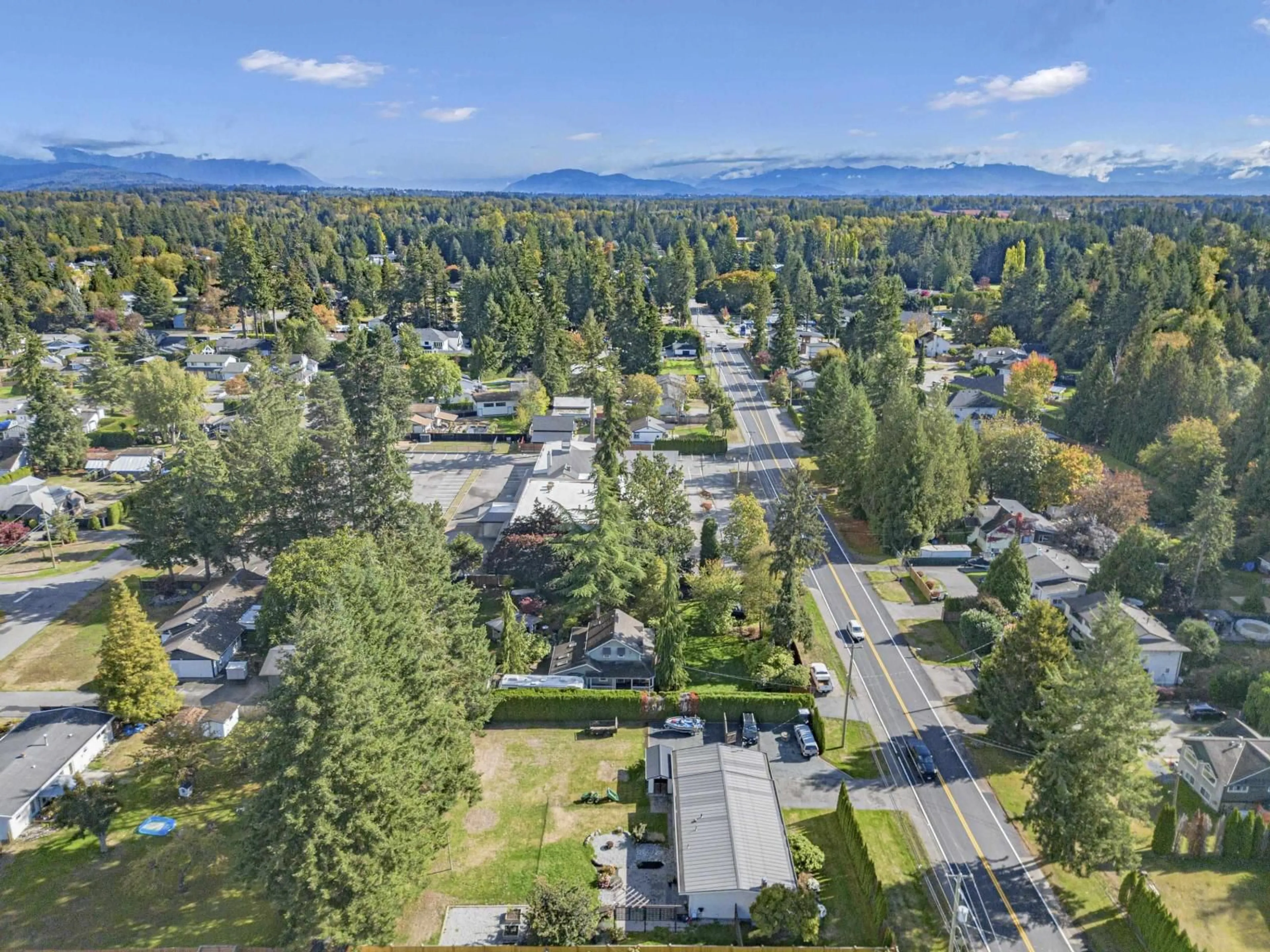 A pic from outside/outdoor area/front of a property/back of a property/a pic from drone, mountain view for 24633 56 AVENUE, Langley British Columbia V2Z1B9