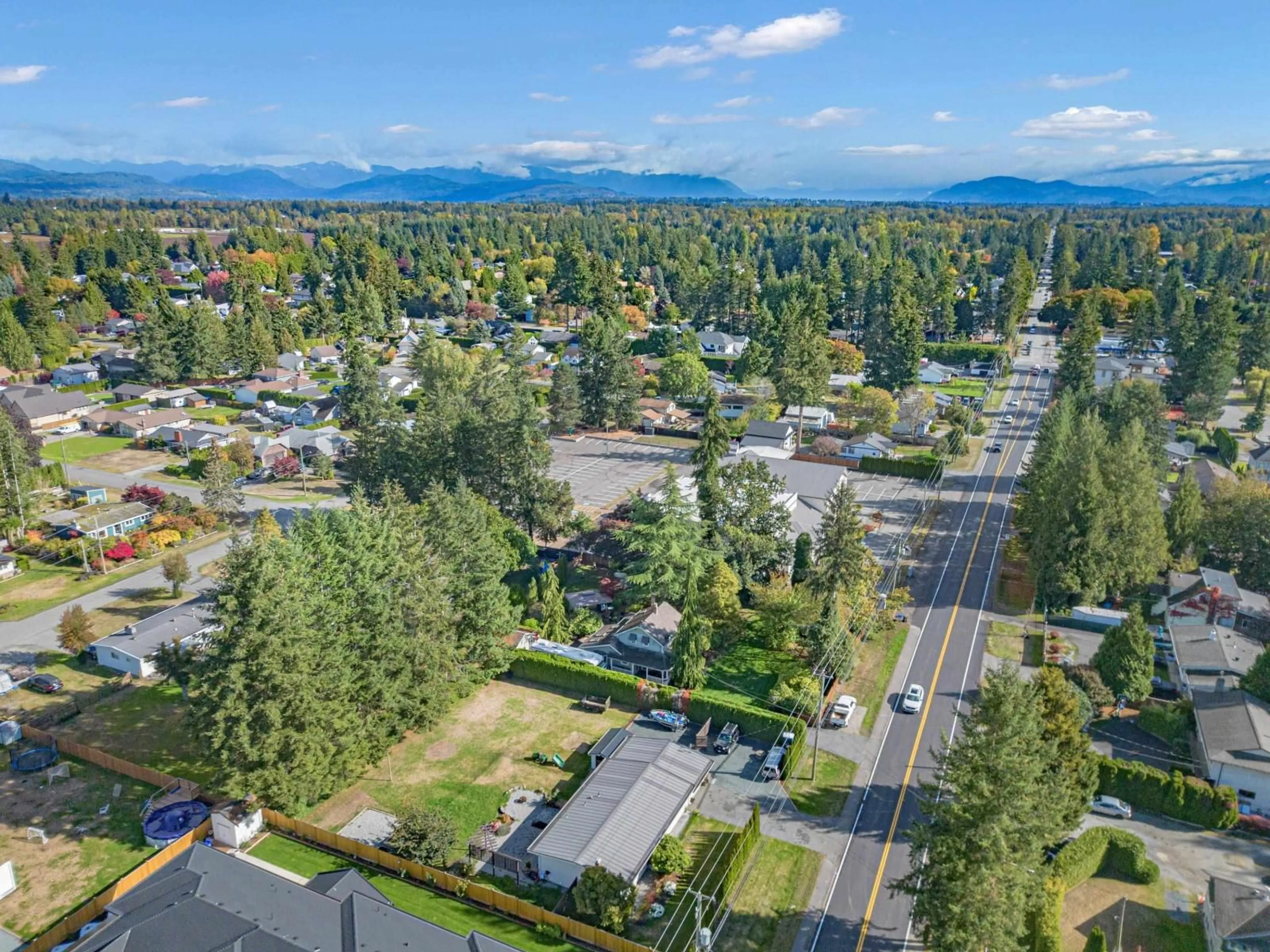 A pic from outside/outdoor area/front of a property/back of a property/a pic from drone, mountain view for 24633 56 AVENUE, Langley British Columbia V2Z1B9