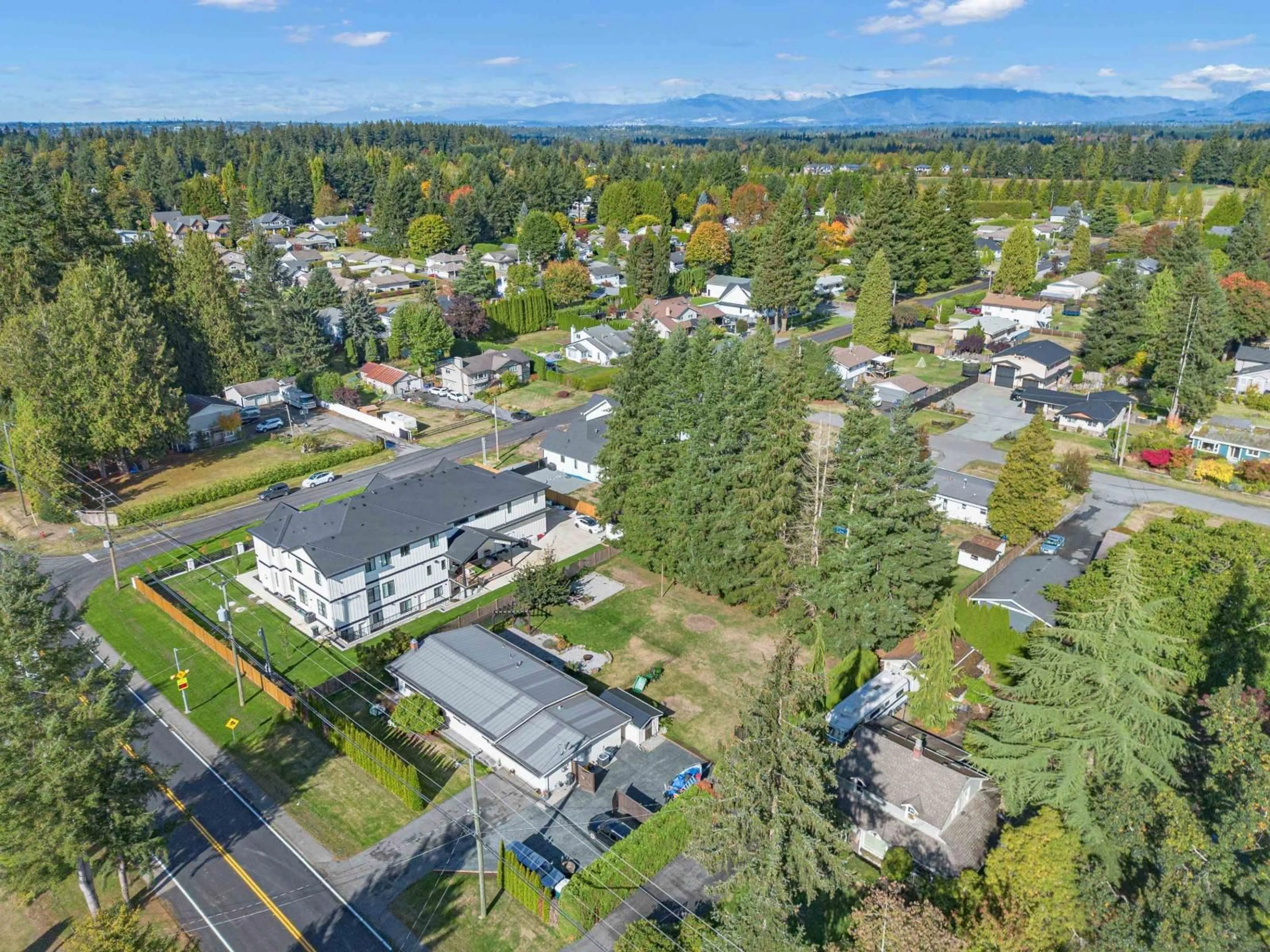 A pic from outside/outdoor area/front of a property/back of a property/a pic from drone, mountain view for 24633 56 AVENUE, Langley British Columbia V2Z1B9