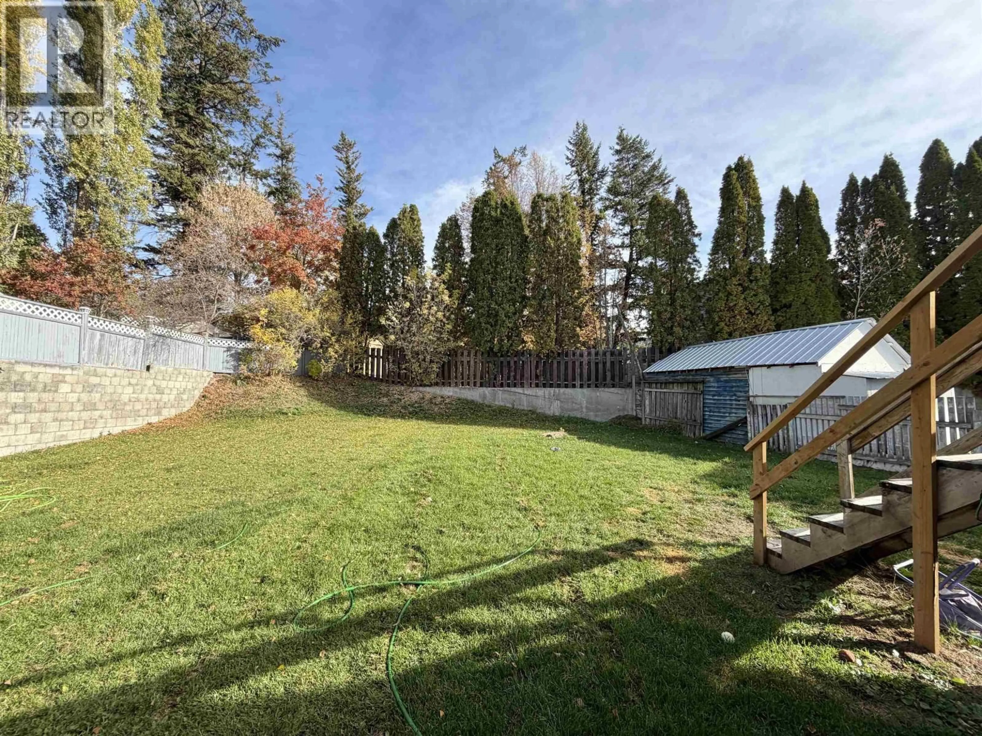 A pic from outside/outdoor area/front of a property/back of a property/a pic from drone, forest/trees view for 960 SECOND AVENUE, Williams Lake British Columbia V2G4C5