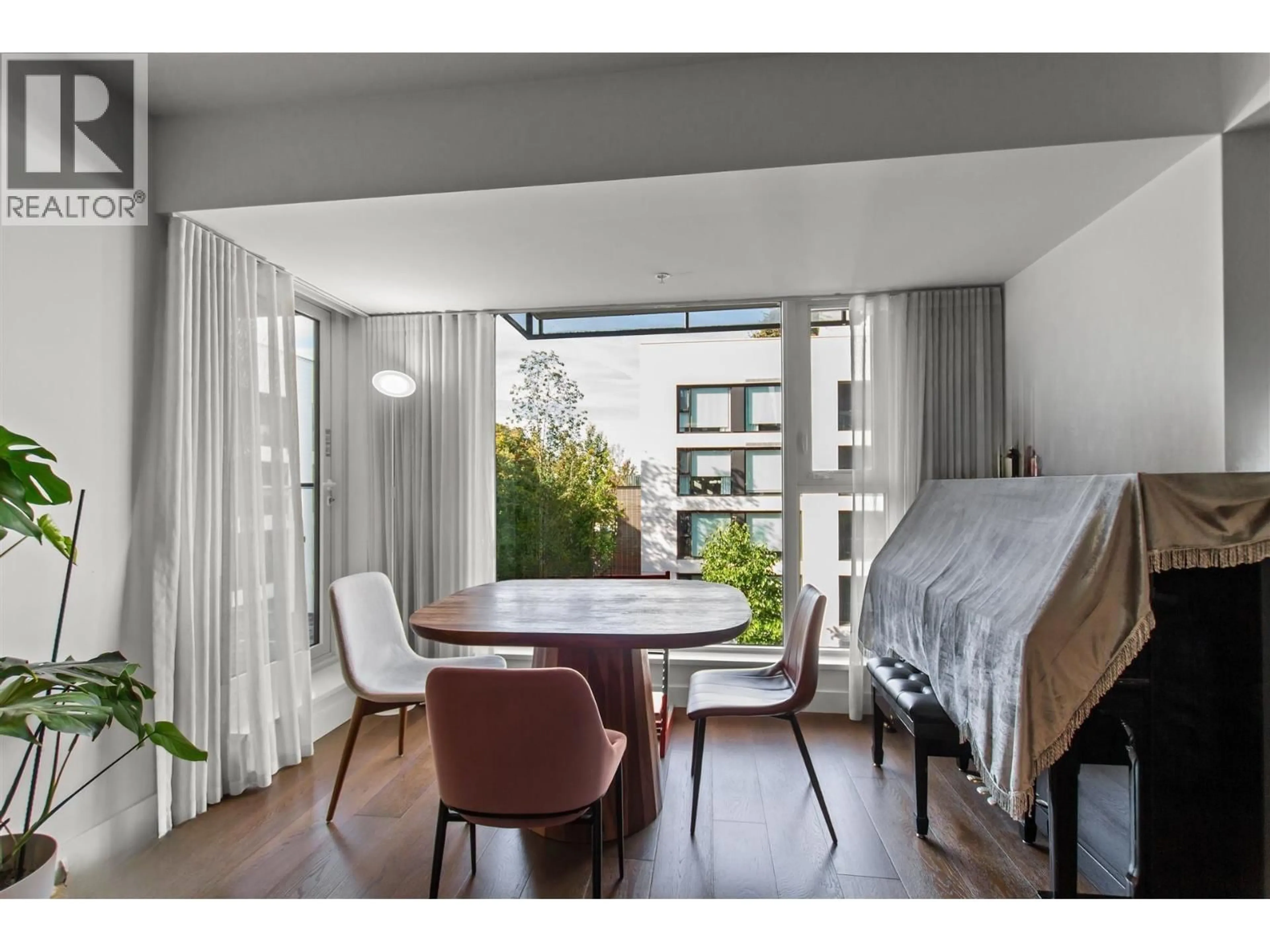 Dining room, wood/laminate floor for 603 - 1571 57TH AVENUE, Vancouver British Columbia V6P0H7