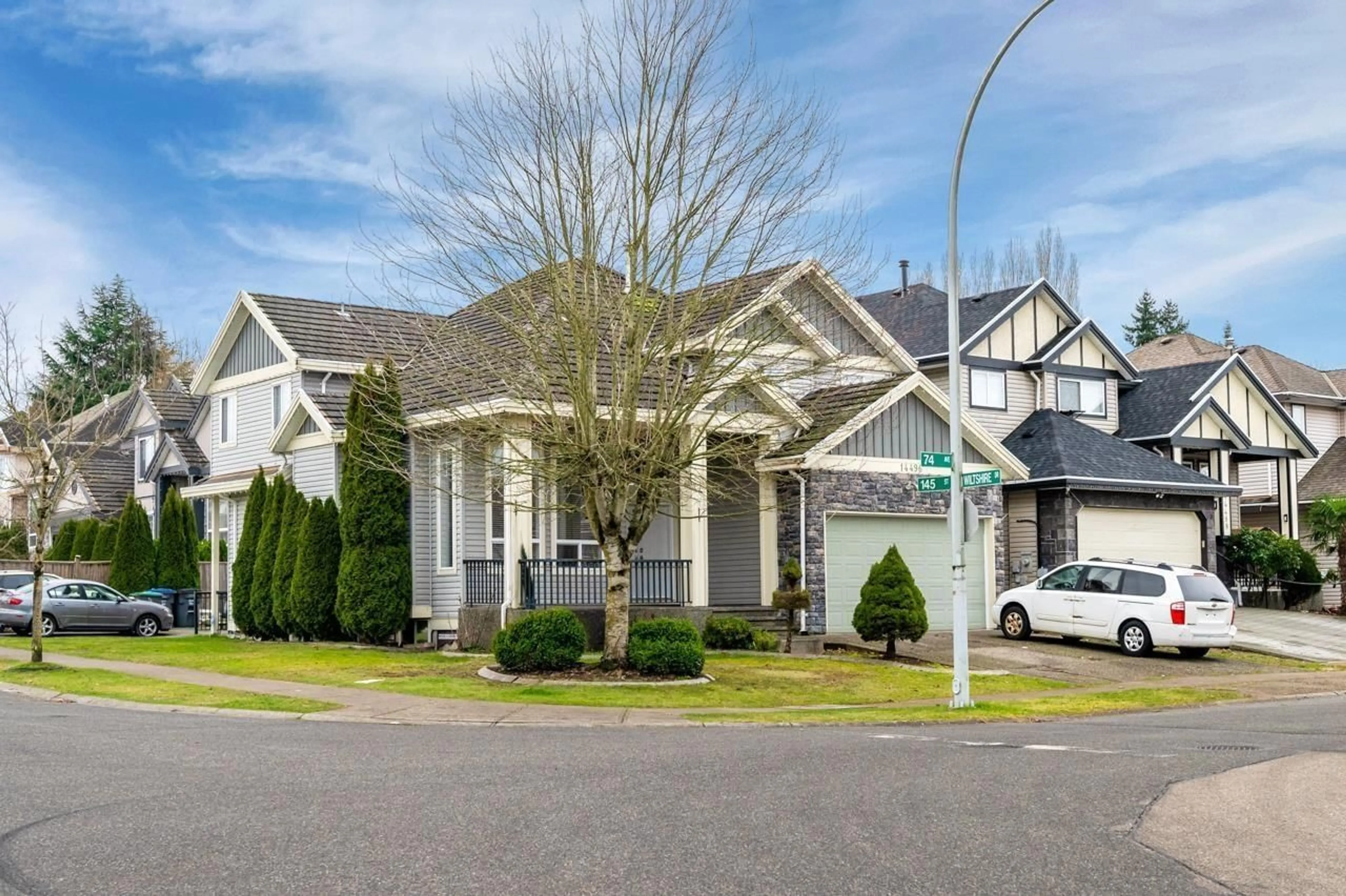 Home with vinyl exterior material, street for 14496 74 AVENUE, Surrey British Columbia V3S0N1