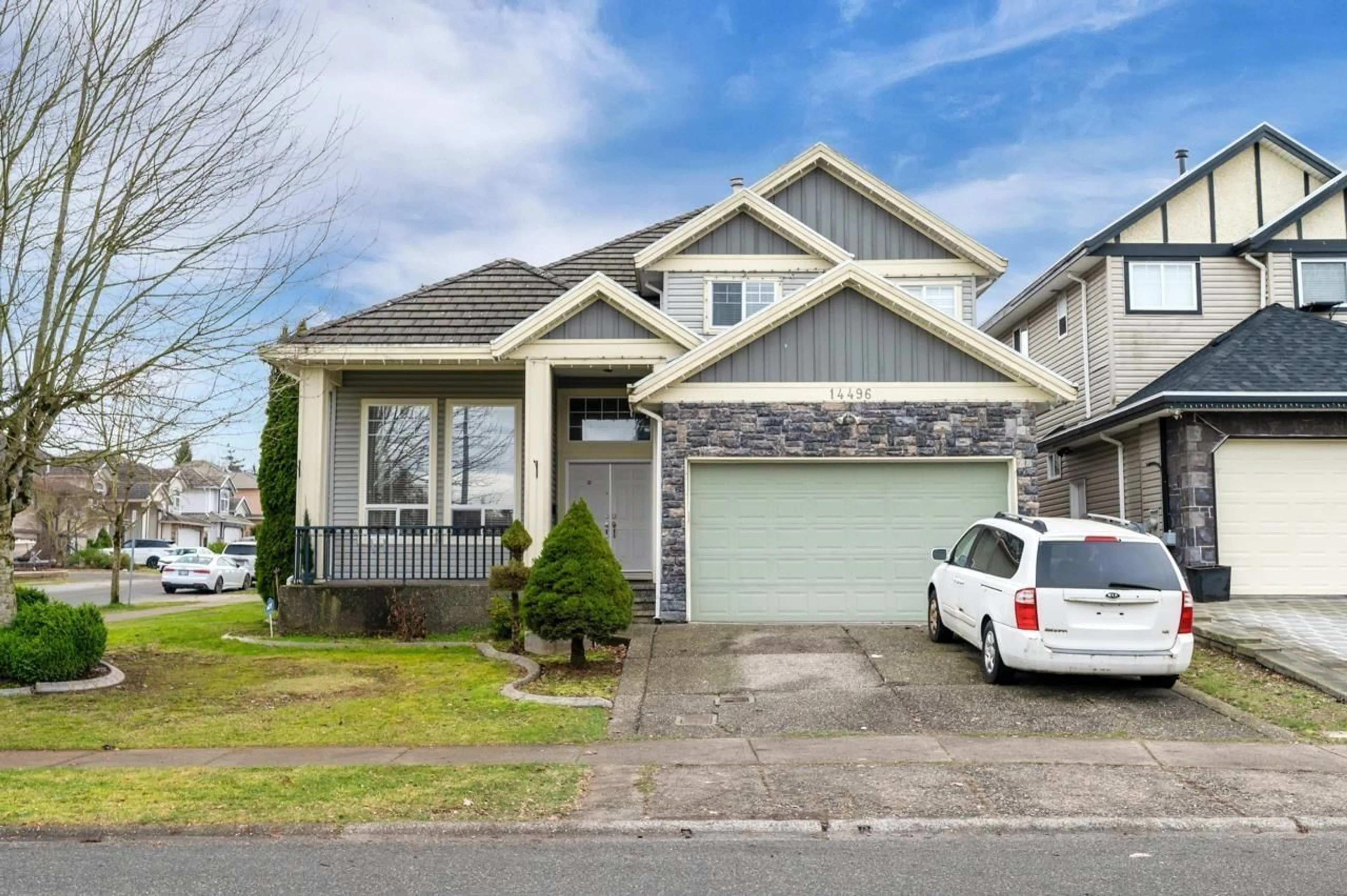 Home with vinyl exterior material, street for 14496 74 AVENUE, Surrey British Columbia V3S0N1