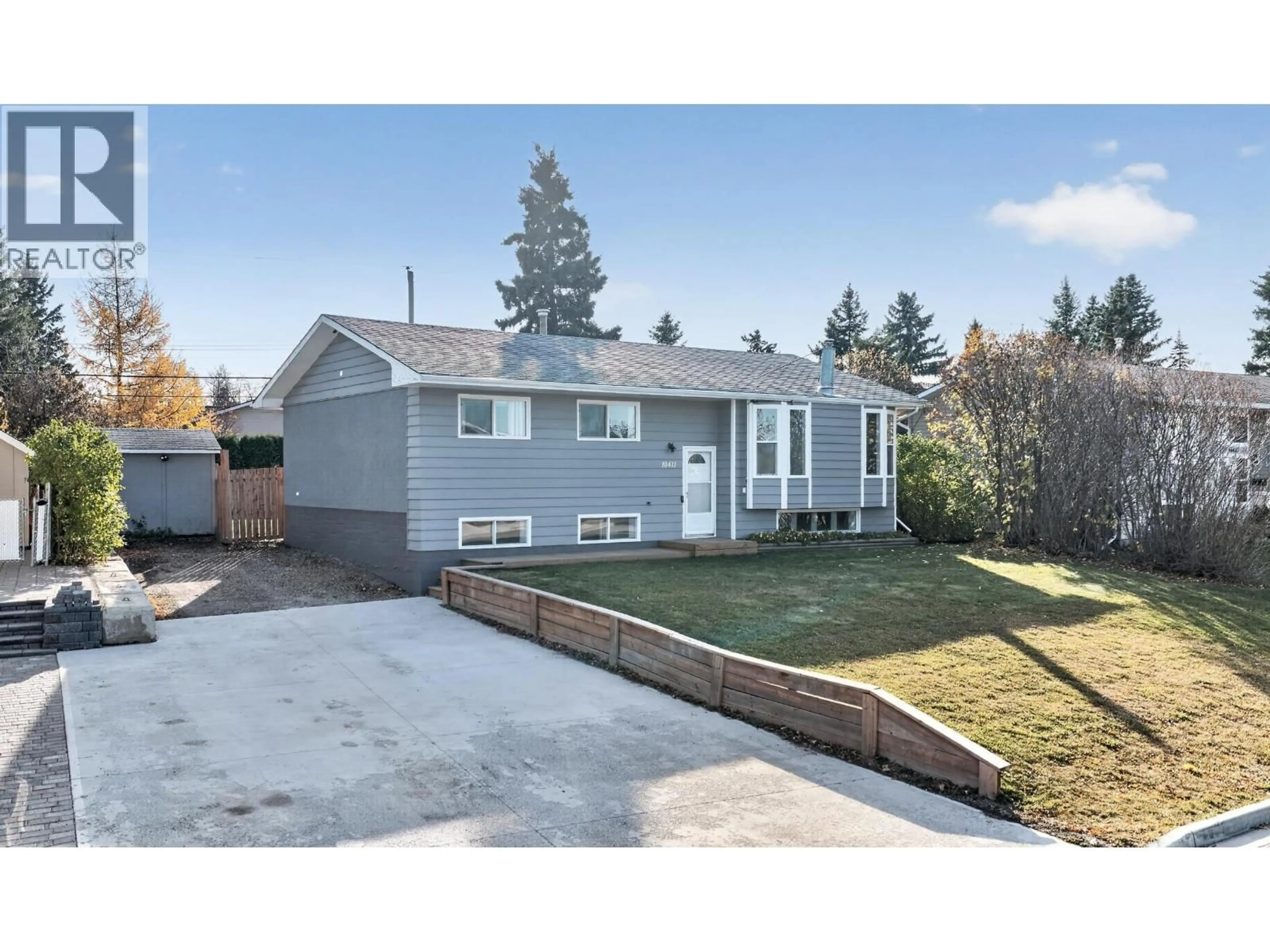 Home with vinyl exterior material, street for 10411 112 AVENUE, Fort St. John British Columbia V1J2W6