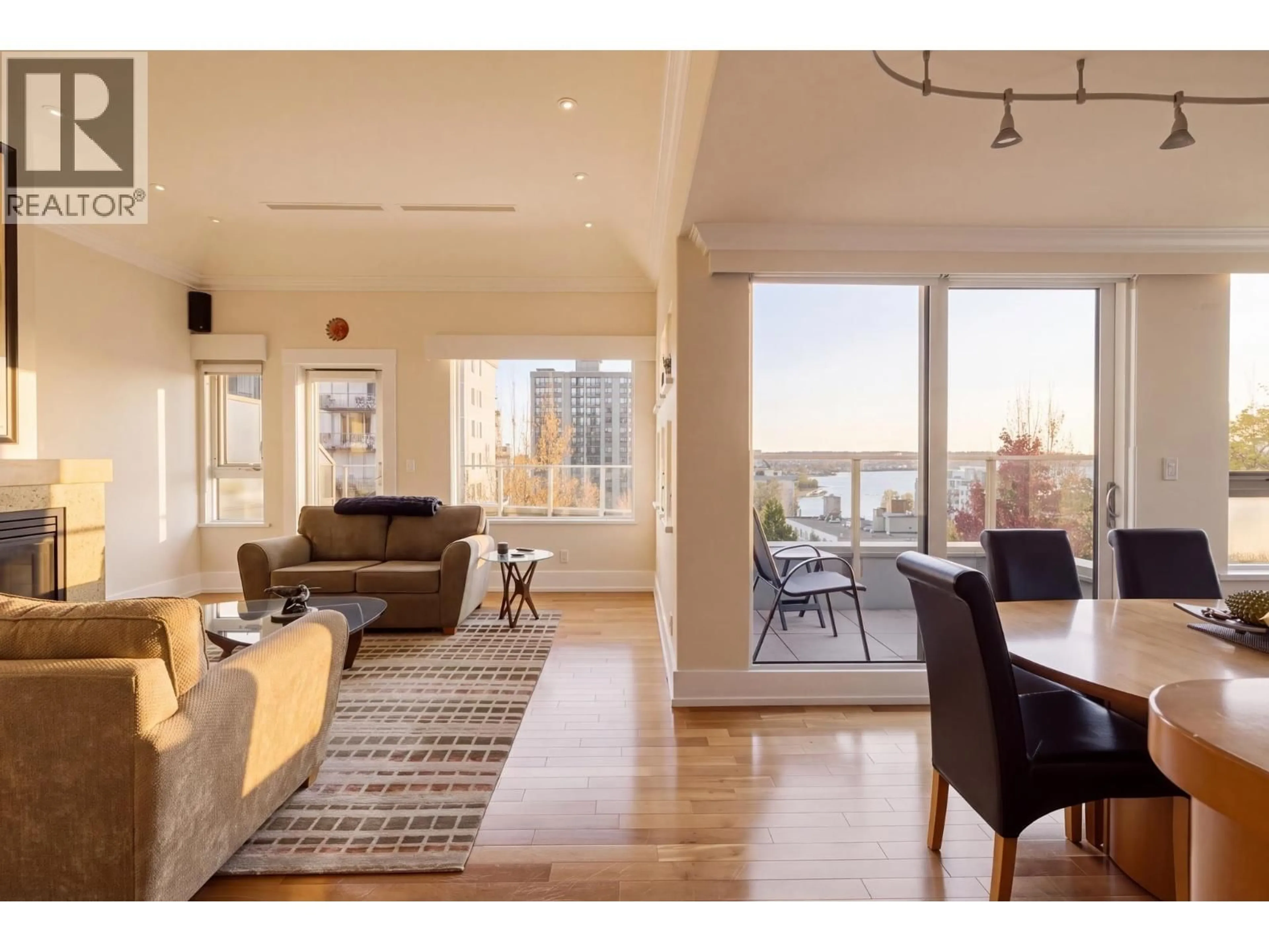 Living room with furniture, wood/laminate floor for 701 - 1345 BURNABY STREET, Vancouver British Columbia V6E1R2