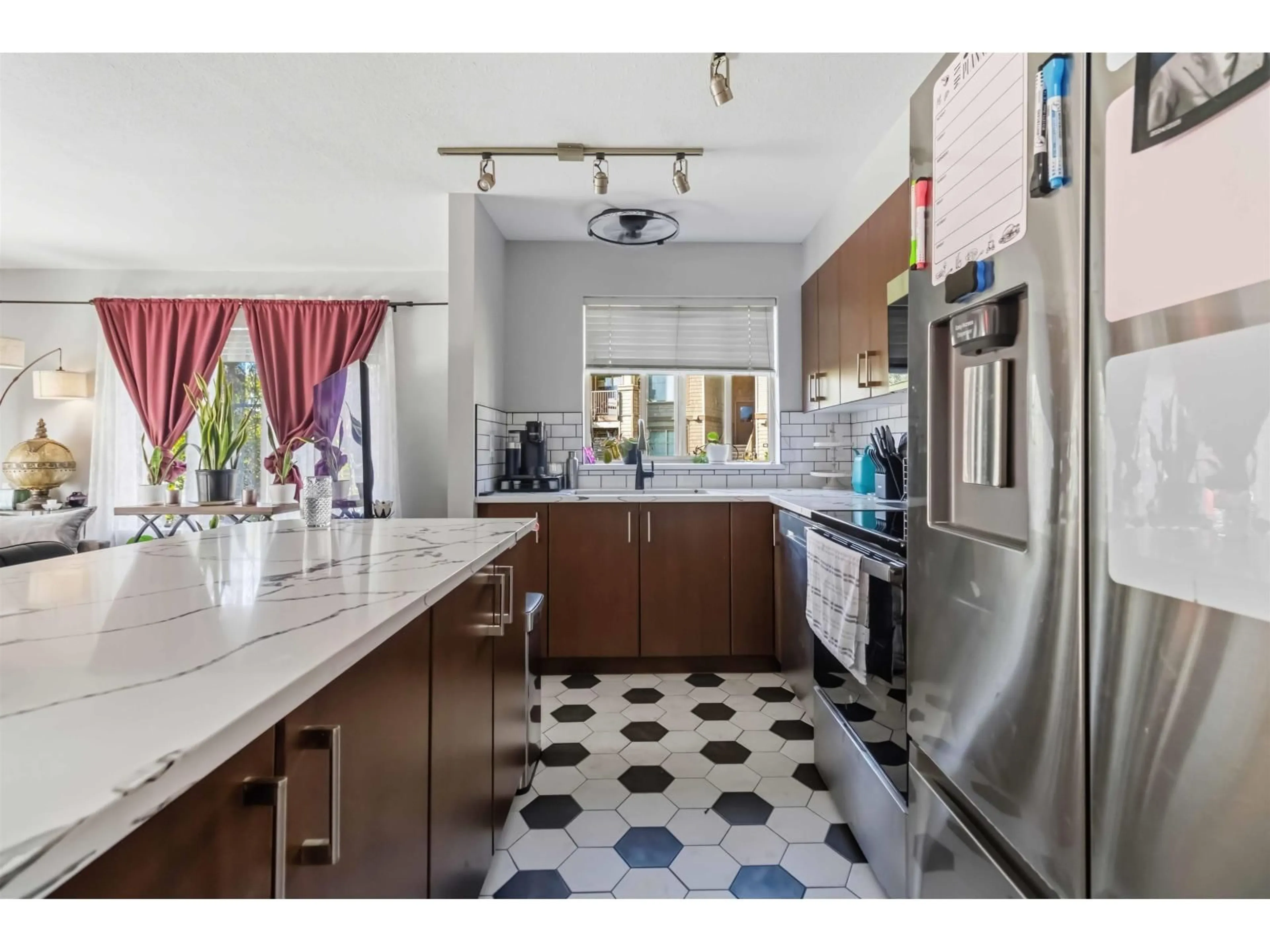 Open concept kitchen, ceramic/tile floor for 111 - 45555 YALE ROAD, Chilliwack British Columbia V2P0A9