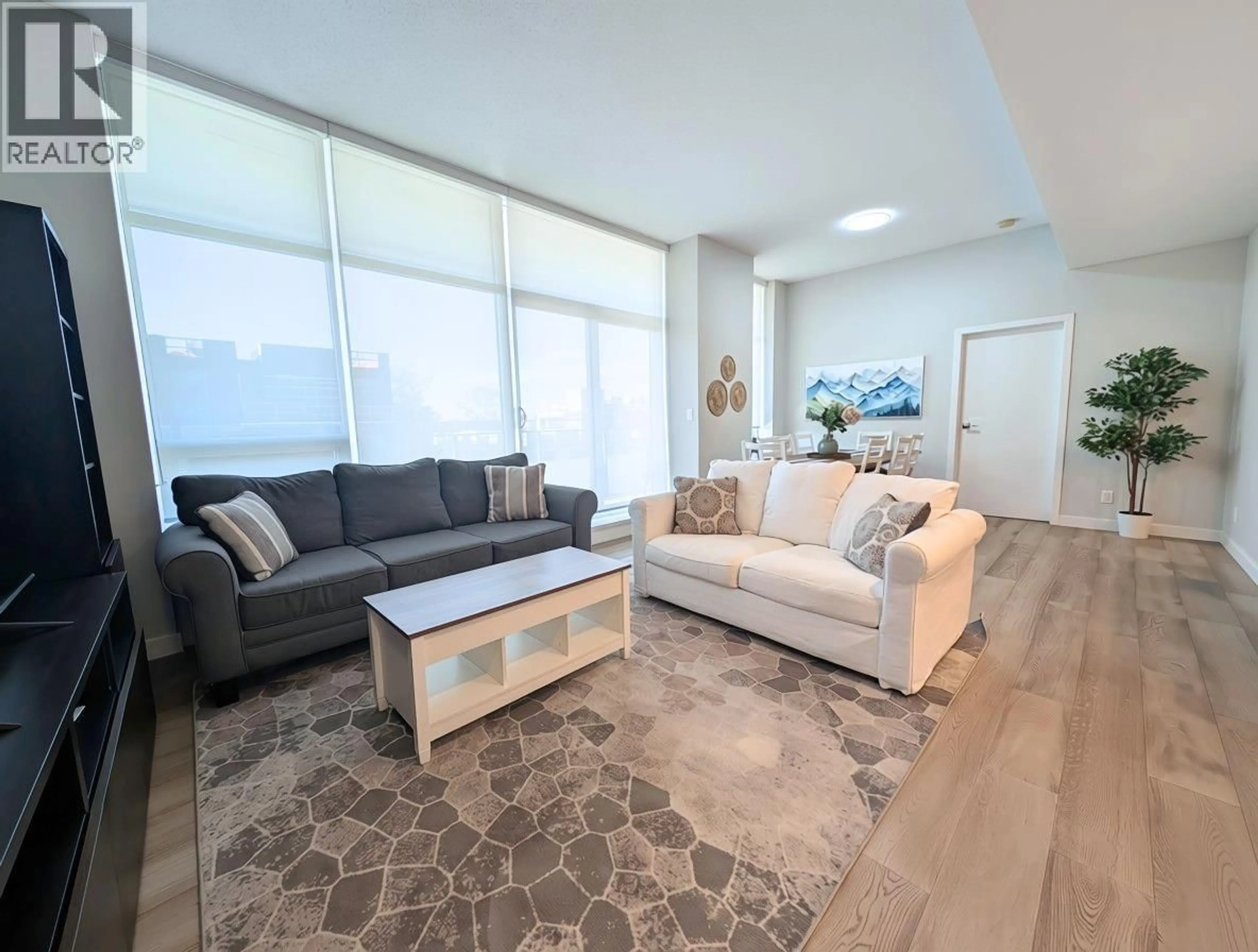 Living room with furniture, unknown for 501 - 5077 CAMBIE STREET, Vancouver British Columbia V5Z0H7