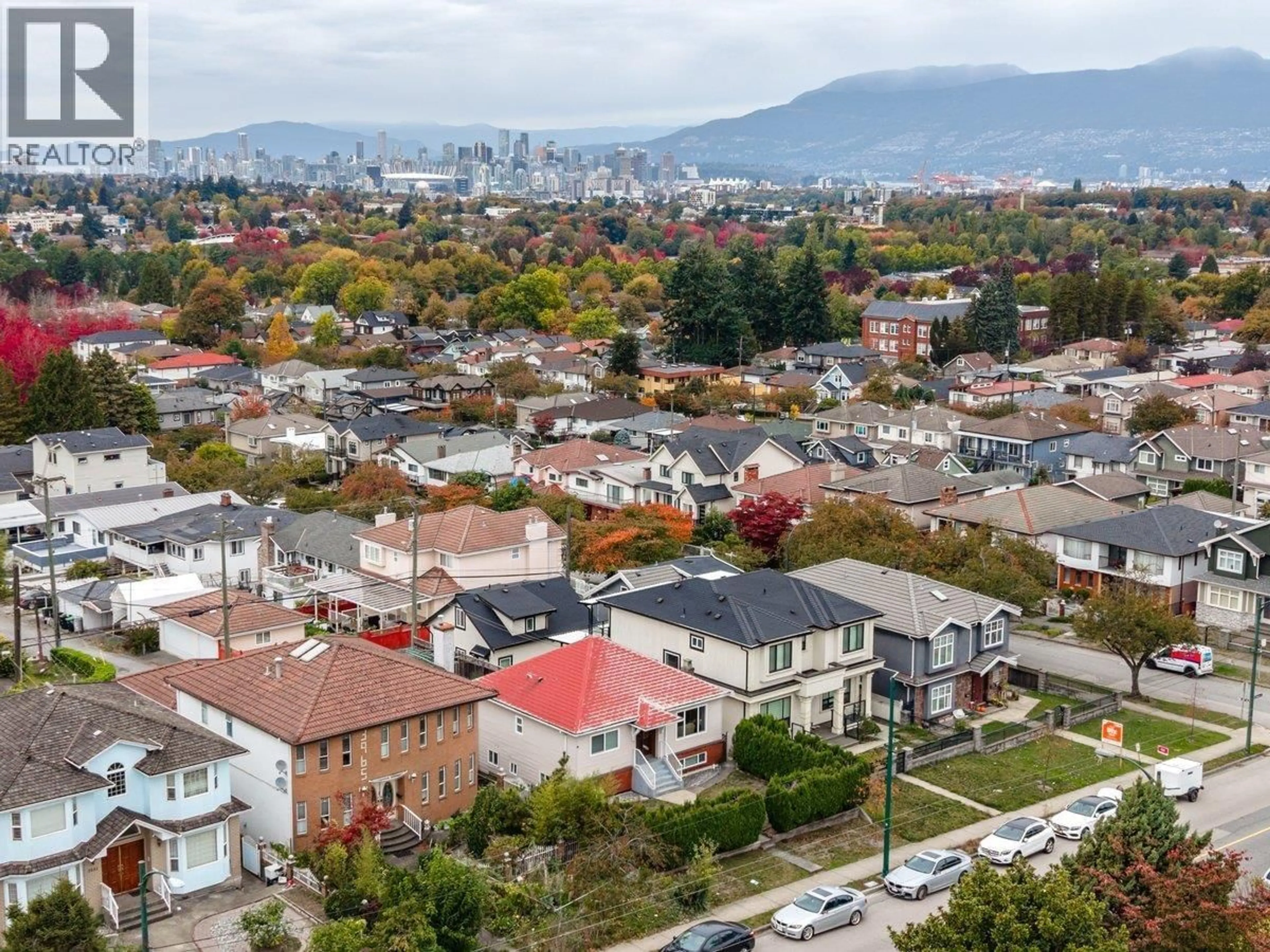 A pic from outside/outdoor area/front of a property/back of a property/a pic from drone, mountain view for 3951 SLOCAN STREET, Vancouver British Columbia V5R1Y7
