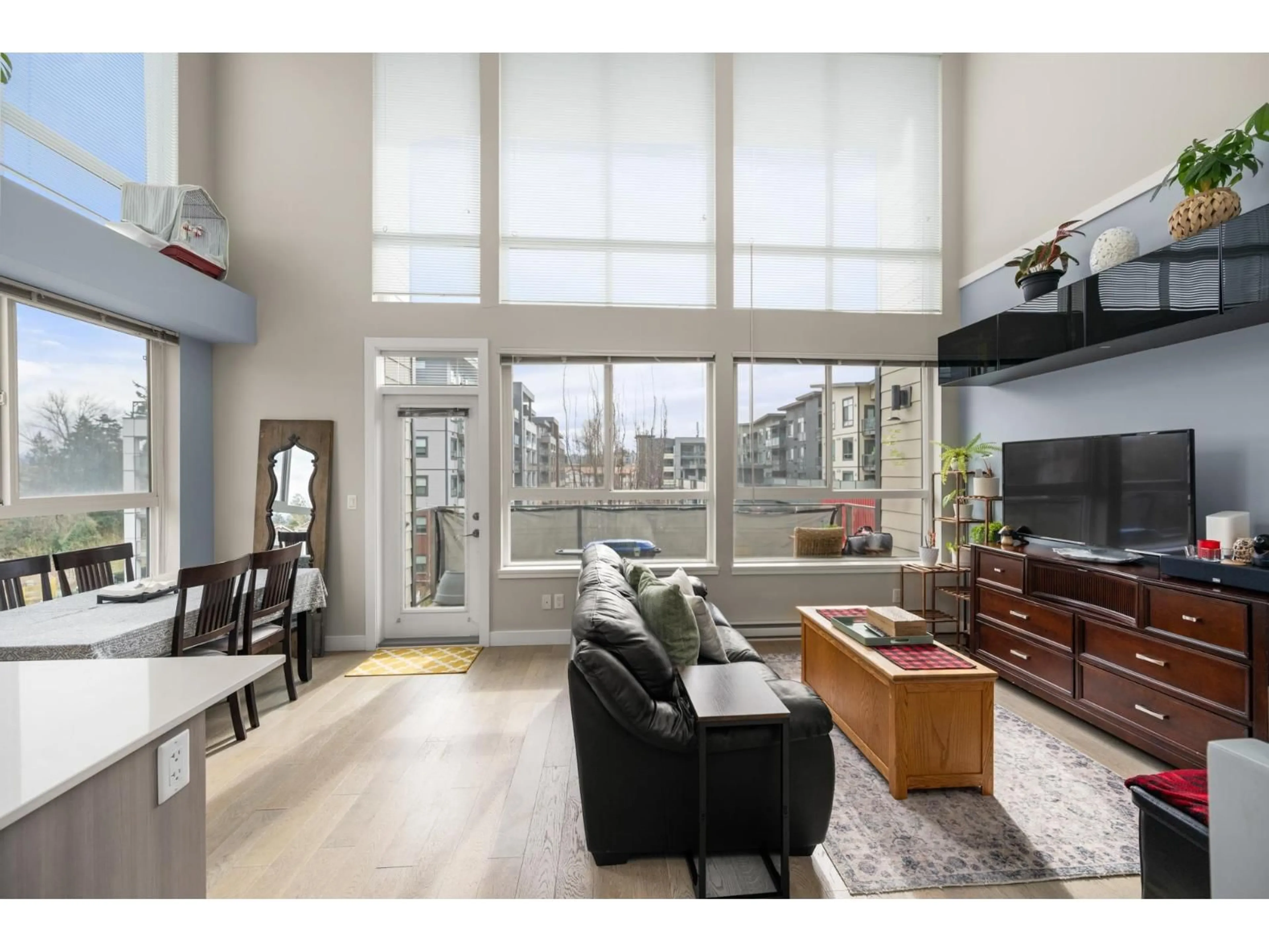 Living room with furniture, wood/laminate floor for 314 - 3080 GLADWIN ROAD, Abbotsford British Columbia V2T0G2