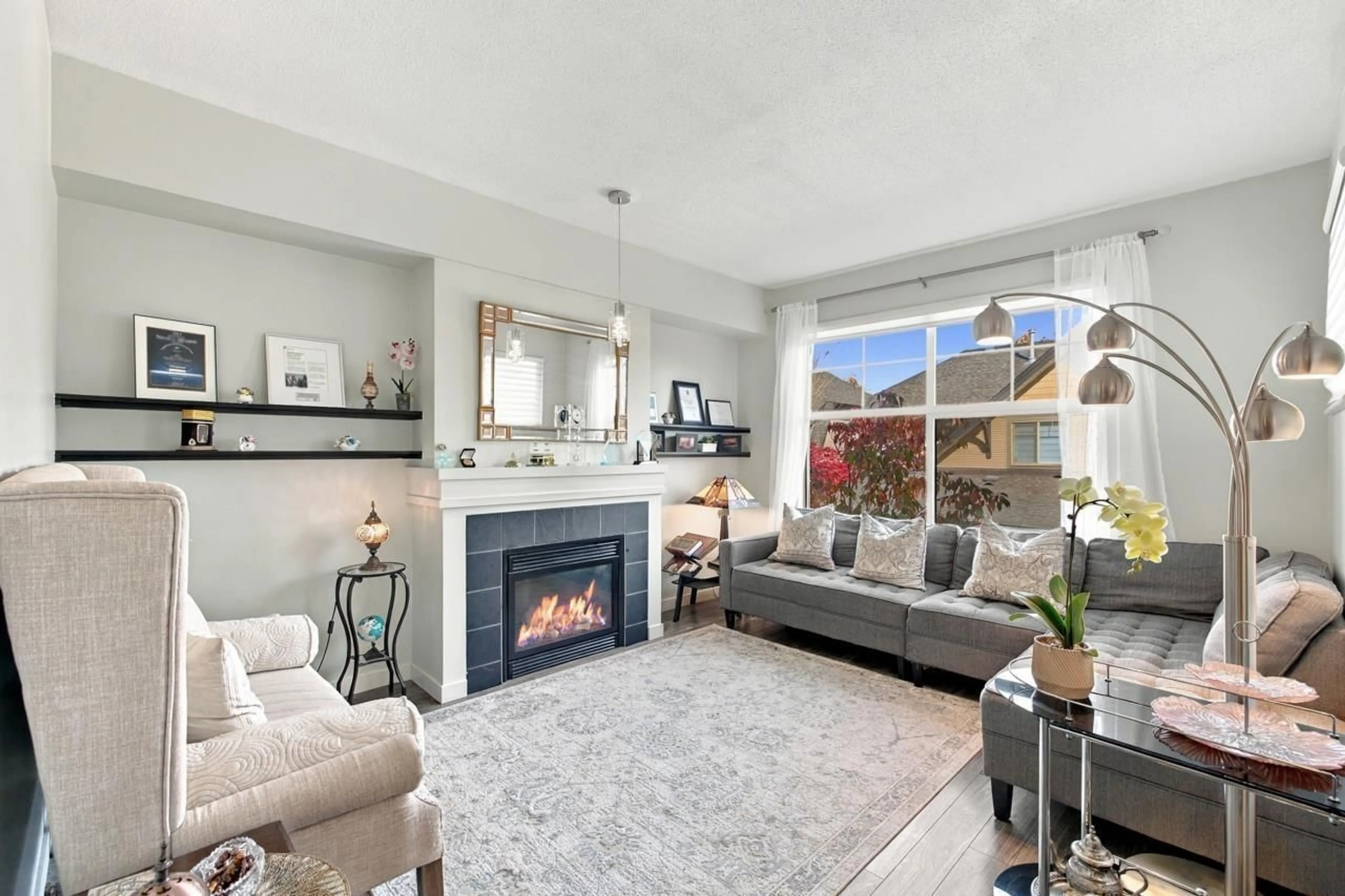 Living room with furniture, ceramic/tile floor for 10 - 15152 62A AVENUE, Surrey British Columbia V3S1V1