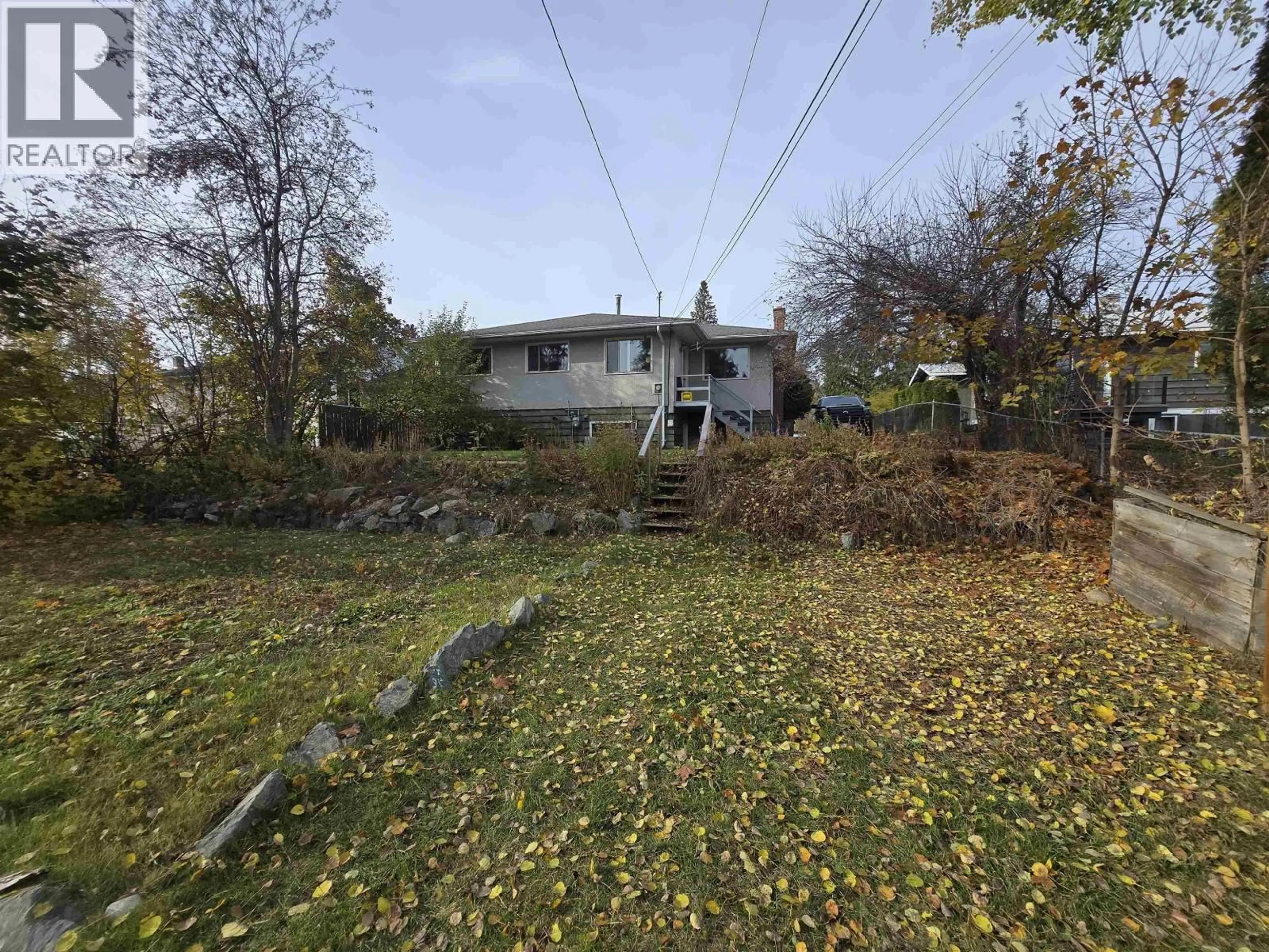 A pic from outside/outdoor area/front of a property/back of a property/a pic from drone, street for 1166 YORSTON AVENUE, Quesnel British Columbia V2J3B4